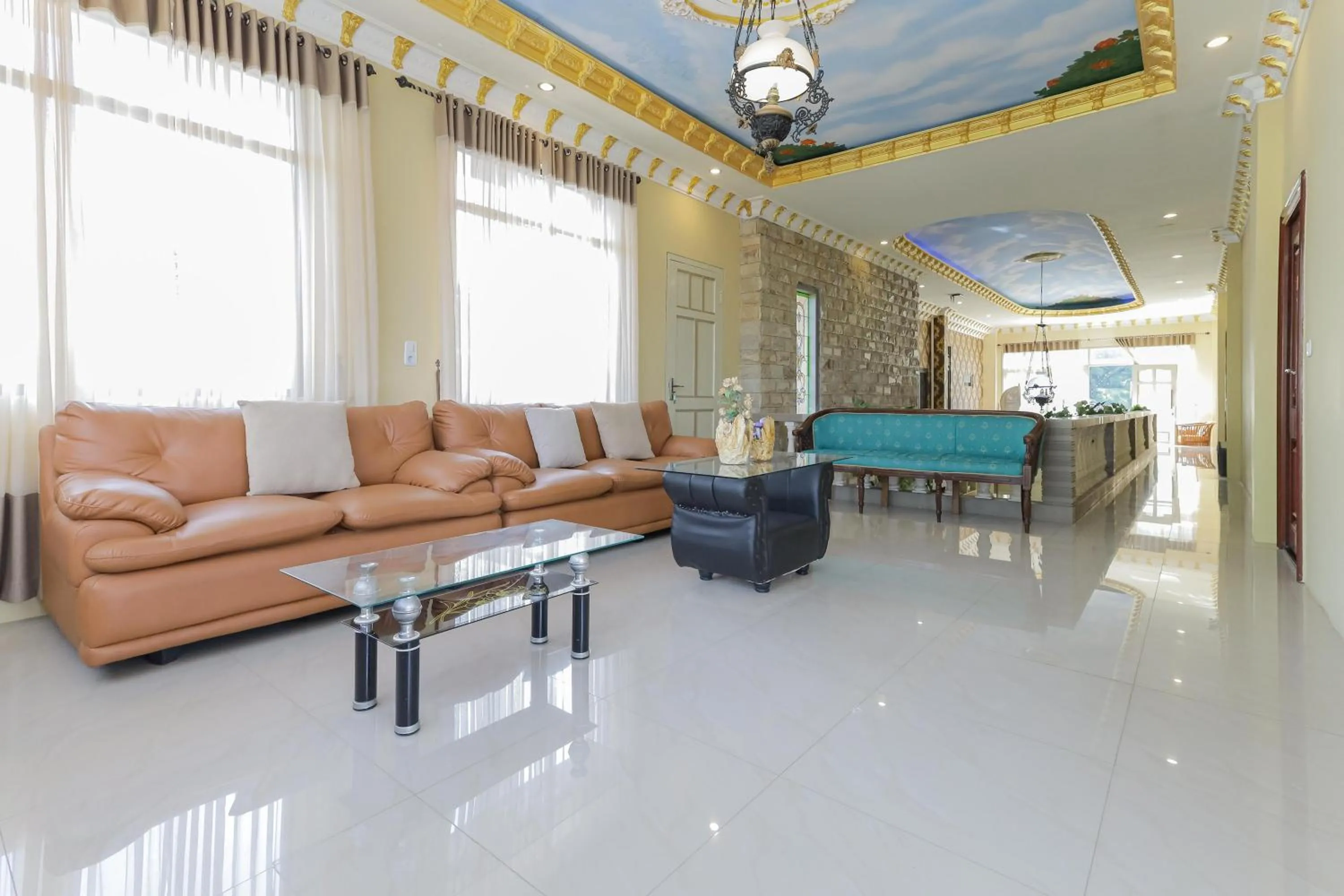 Living room in RedDoorz Plus @ Villa Bontes Batu