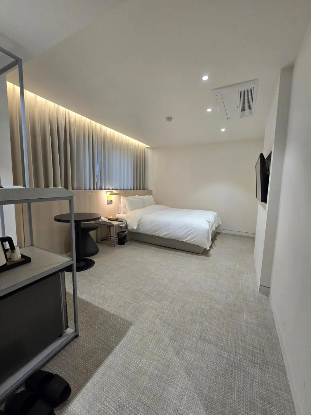 air conditioner, Bed in Hotel The Grang Seogwipo