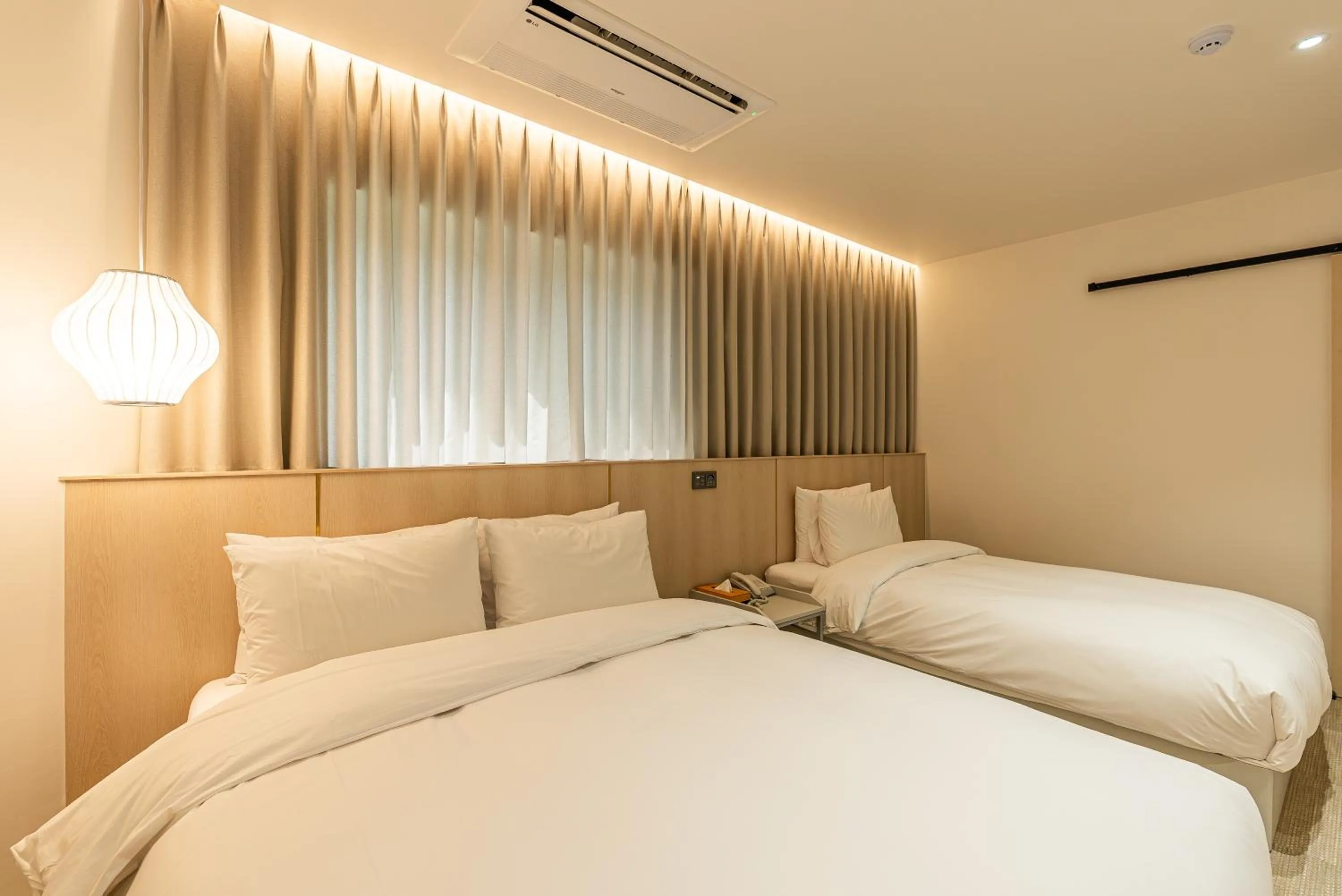 Bed in Hotel The Grang Seogwipo