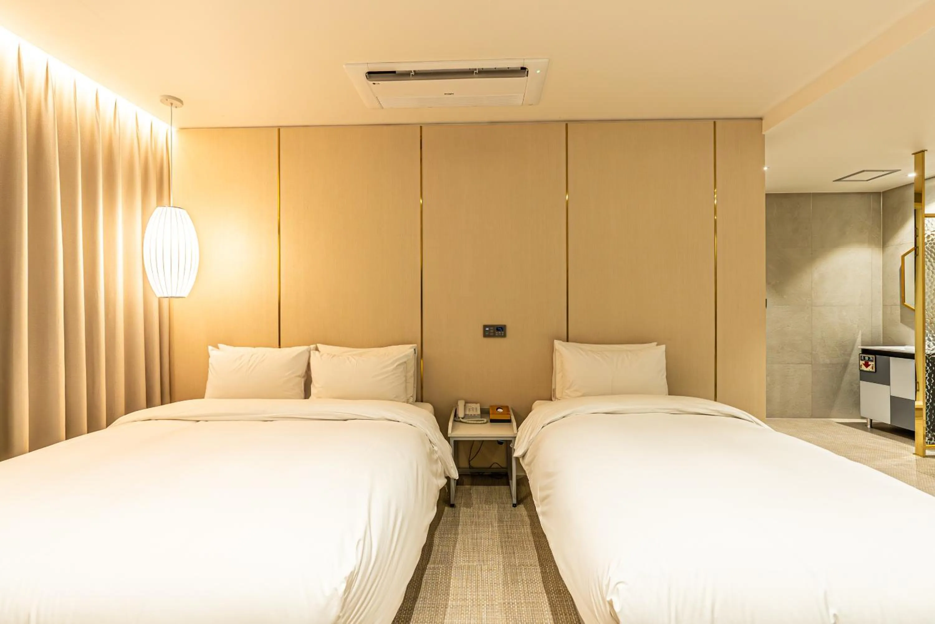 Bed in Hotel The Grang Seogwipo