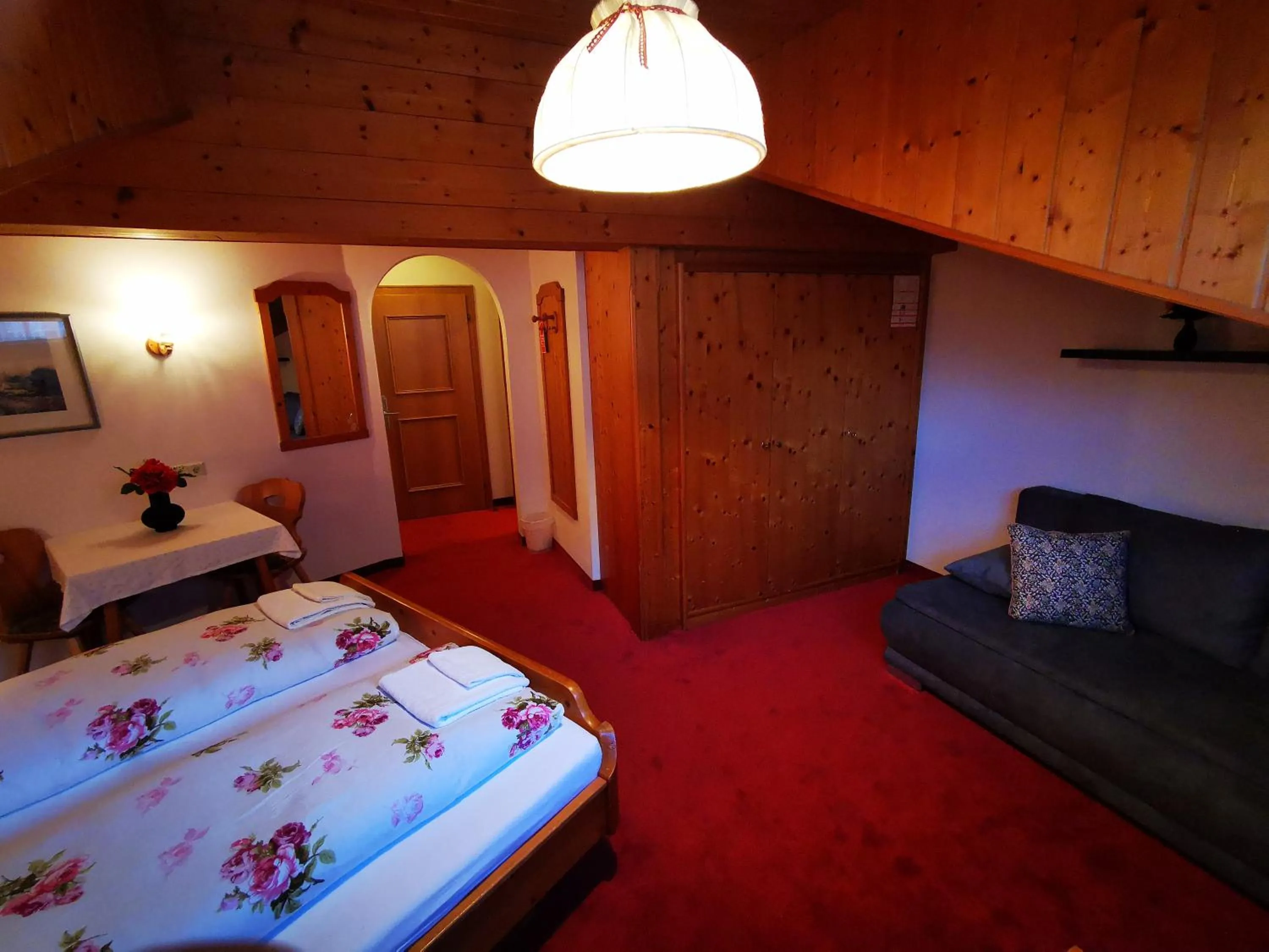 Photo of the whole room, Bed in Gasthof Geronimo