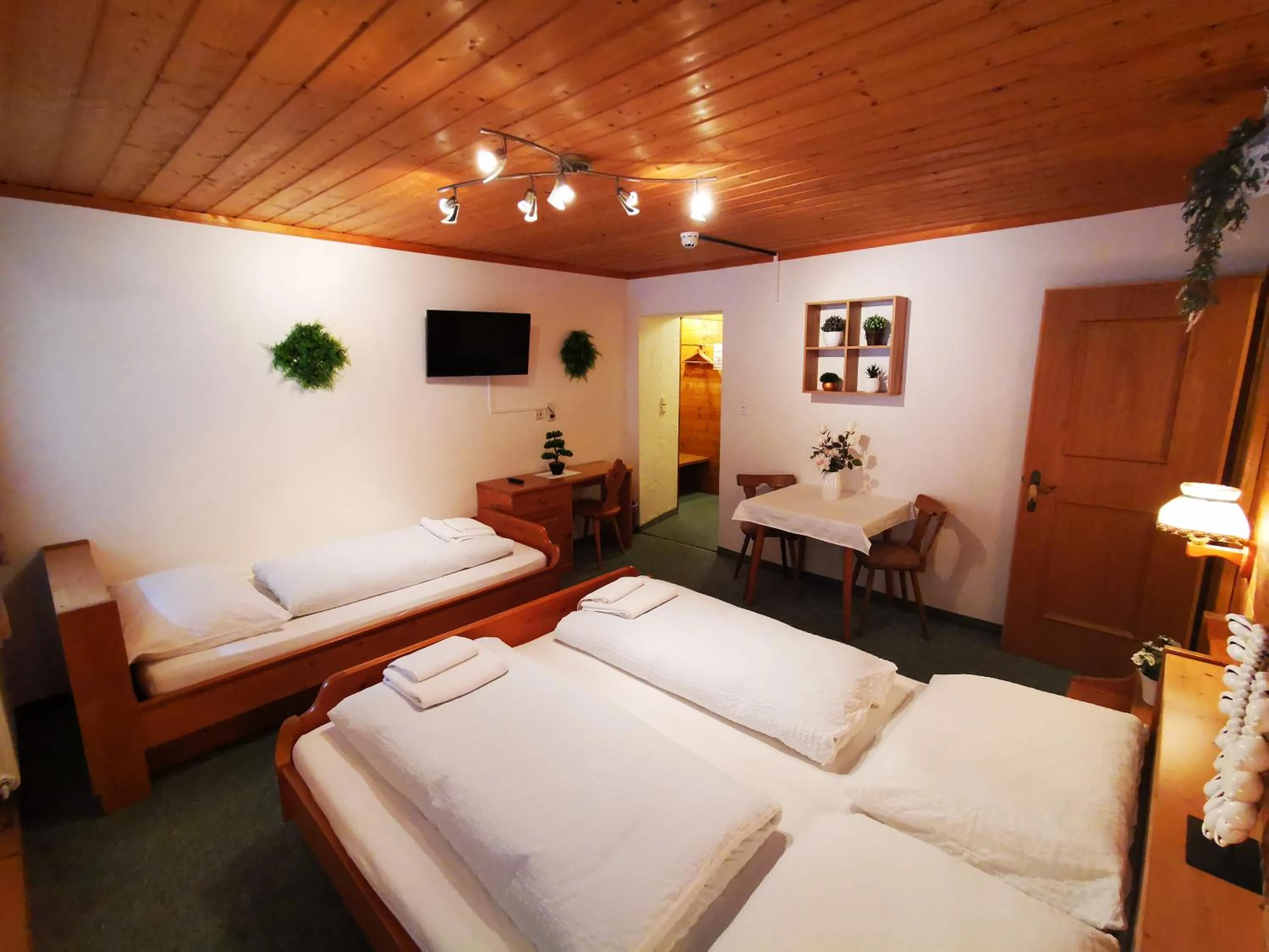 Photo of the whole room, Bed in Gasthof Geronimo