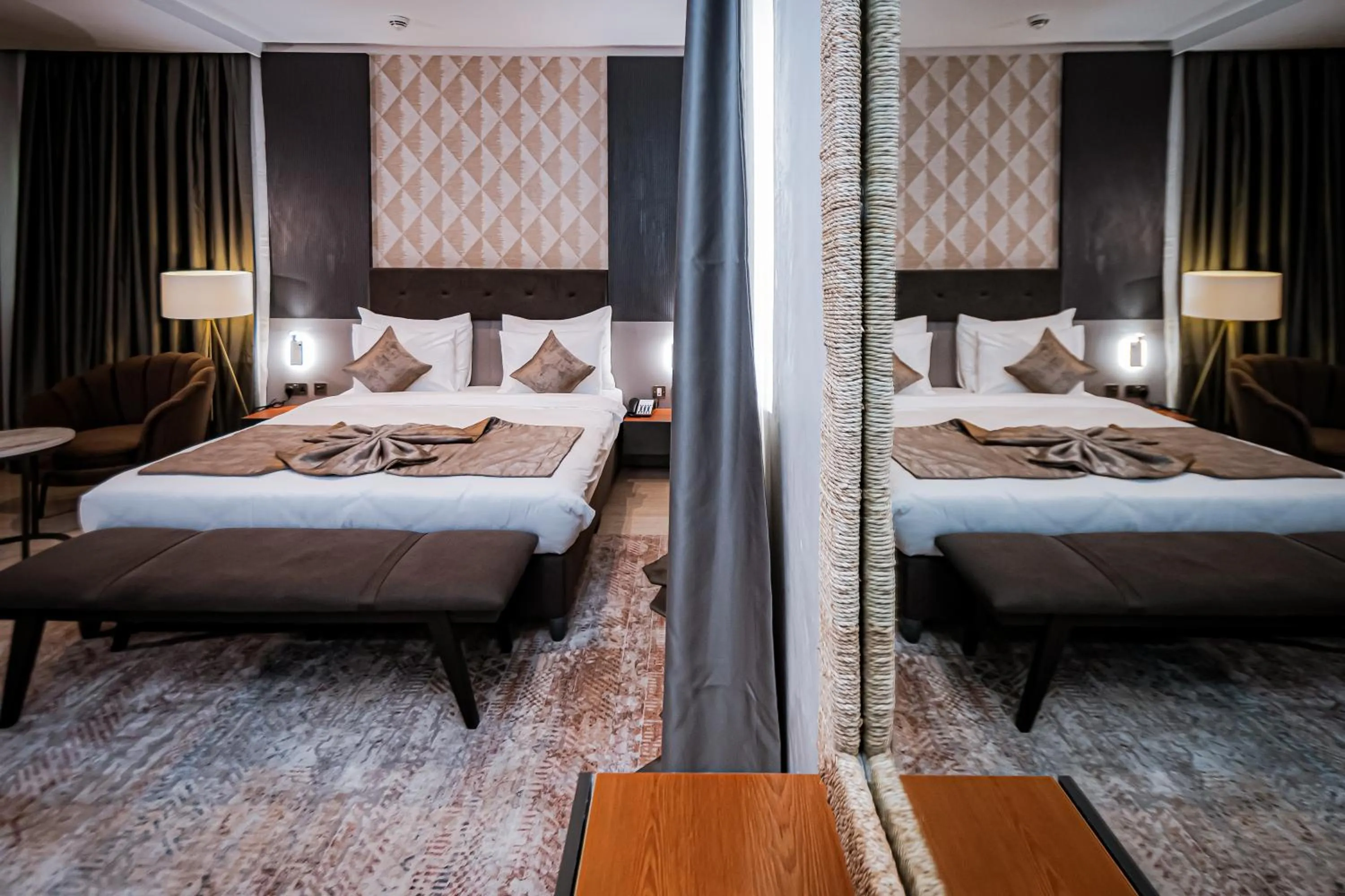 Bed in Wali's Suites