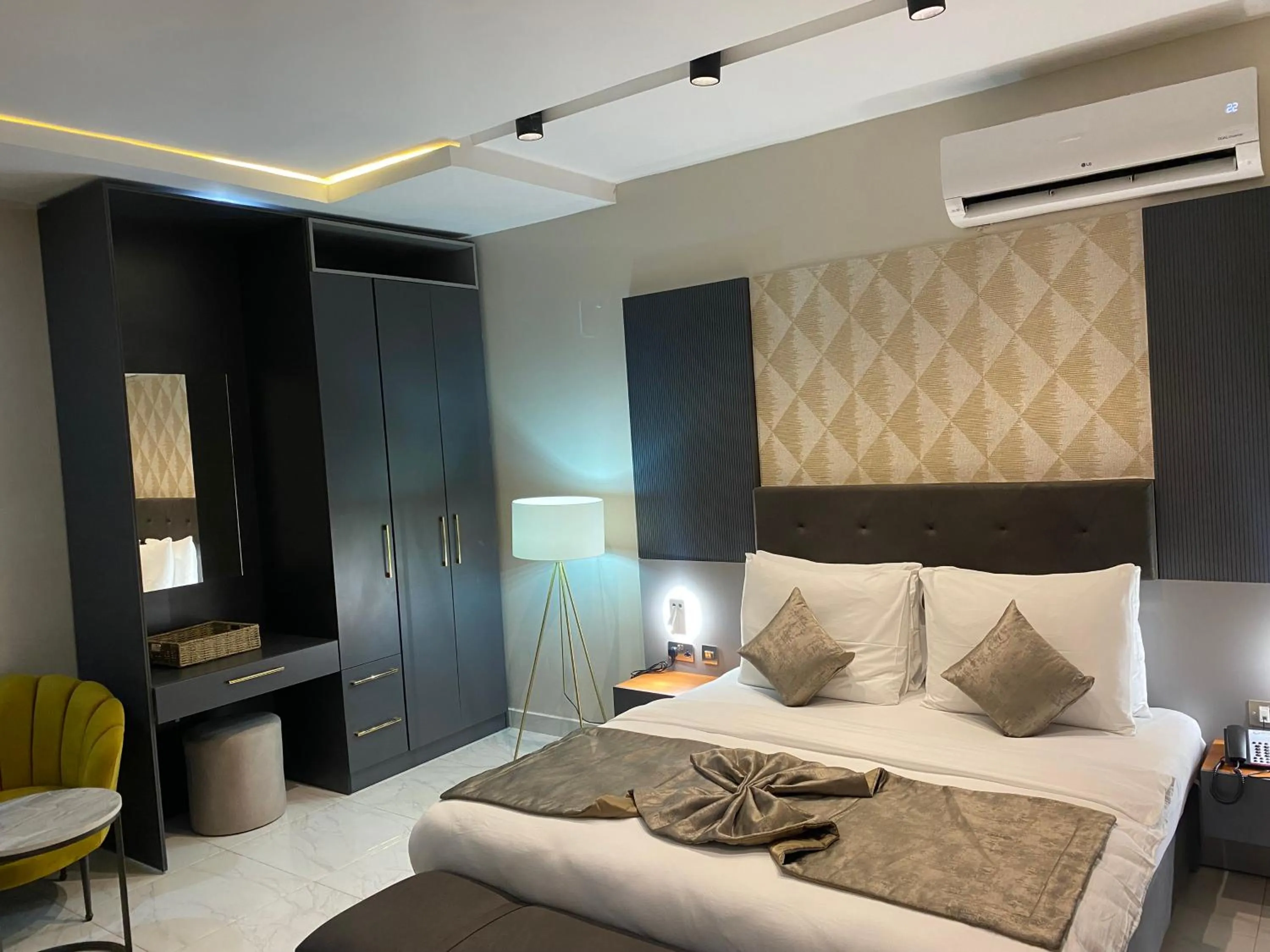 Bed in Wali's Suites