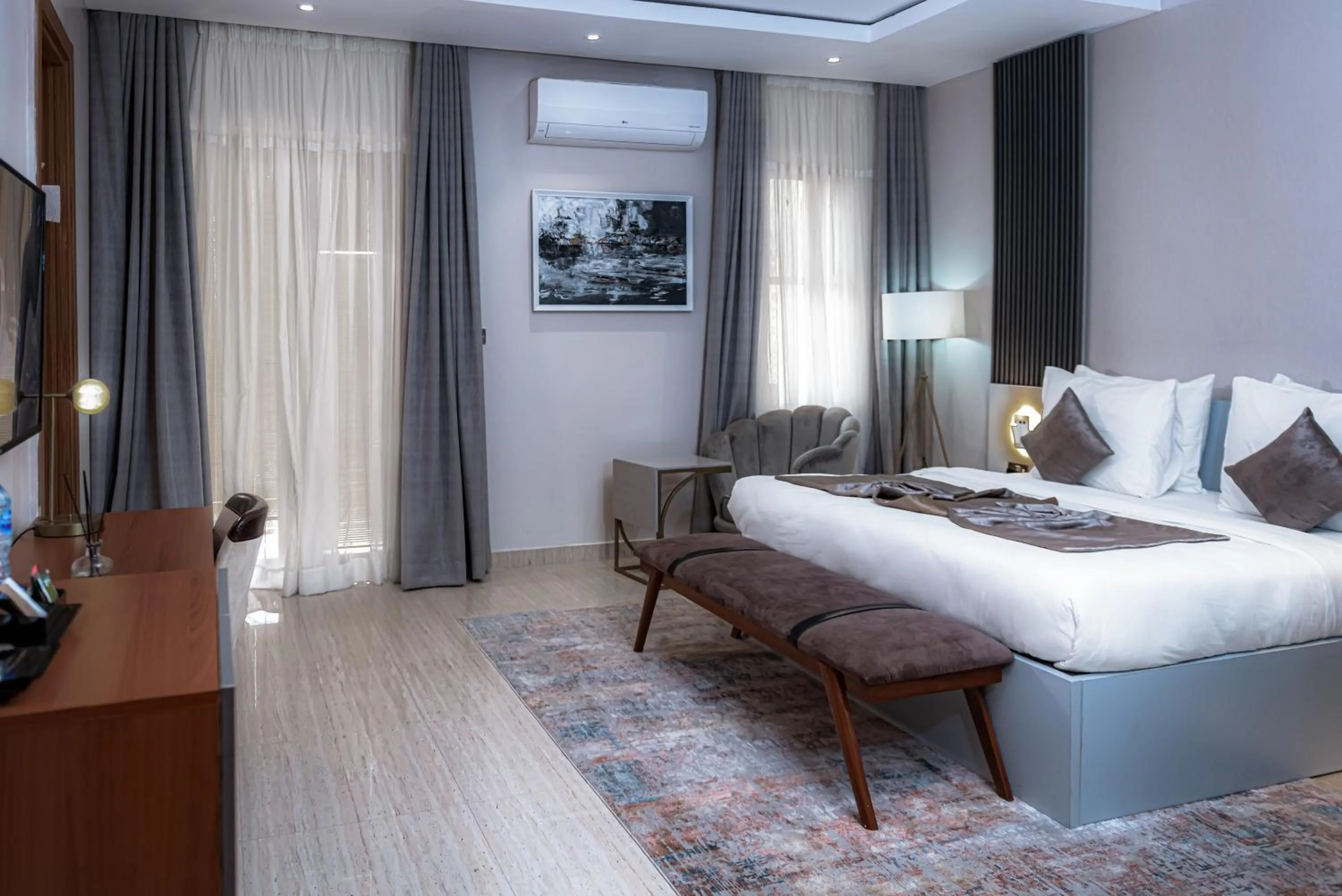 Bed in Wali's Suites