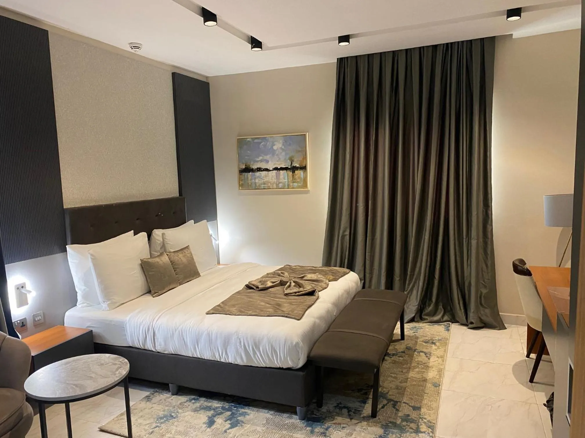 Bed in Wali's Suites