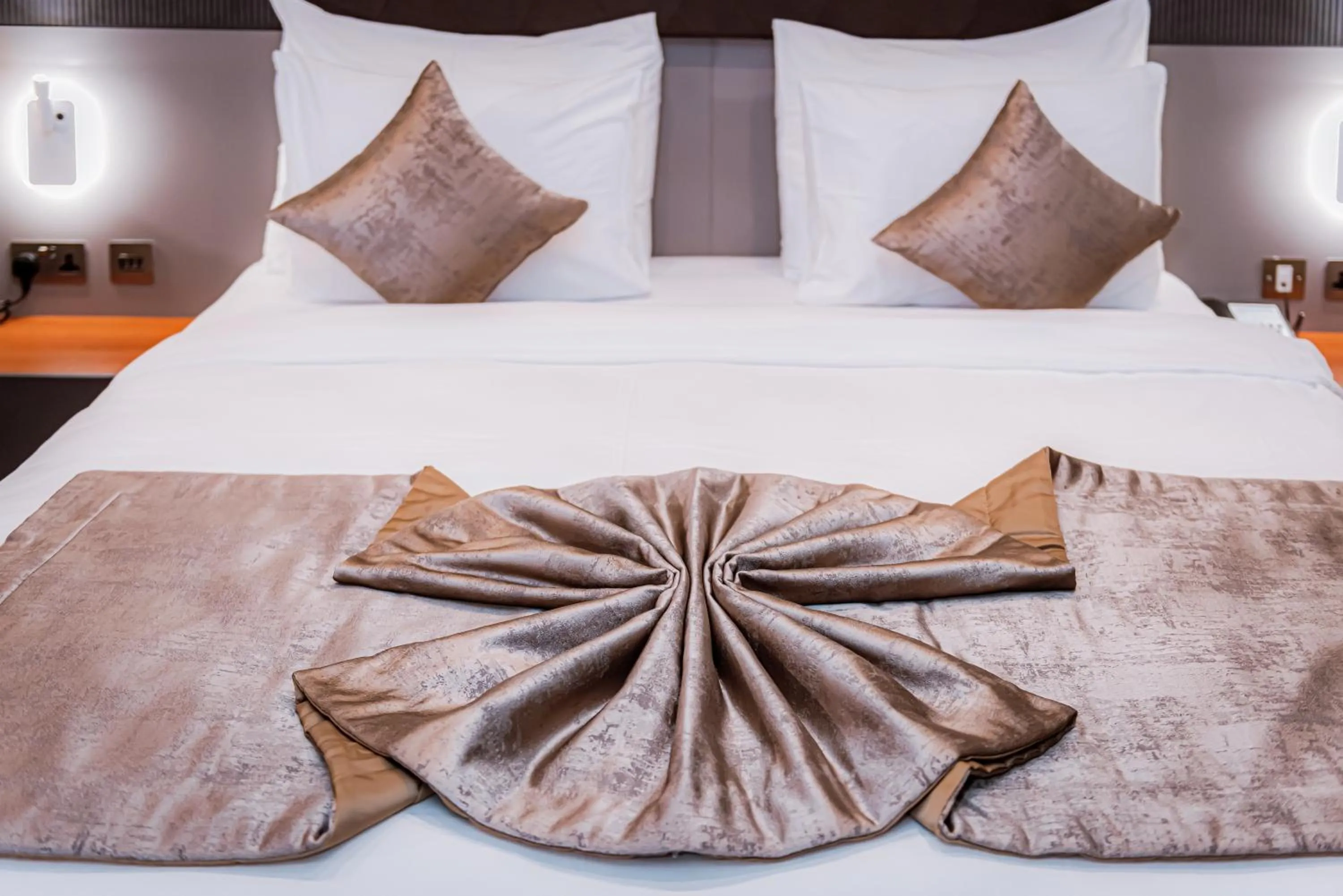 Bed in Wali's Suites