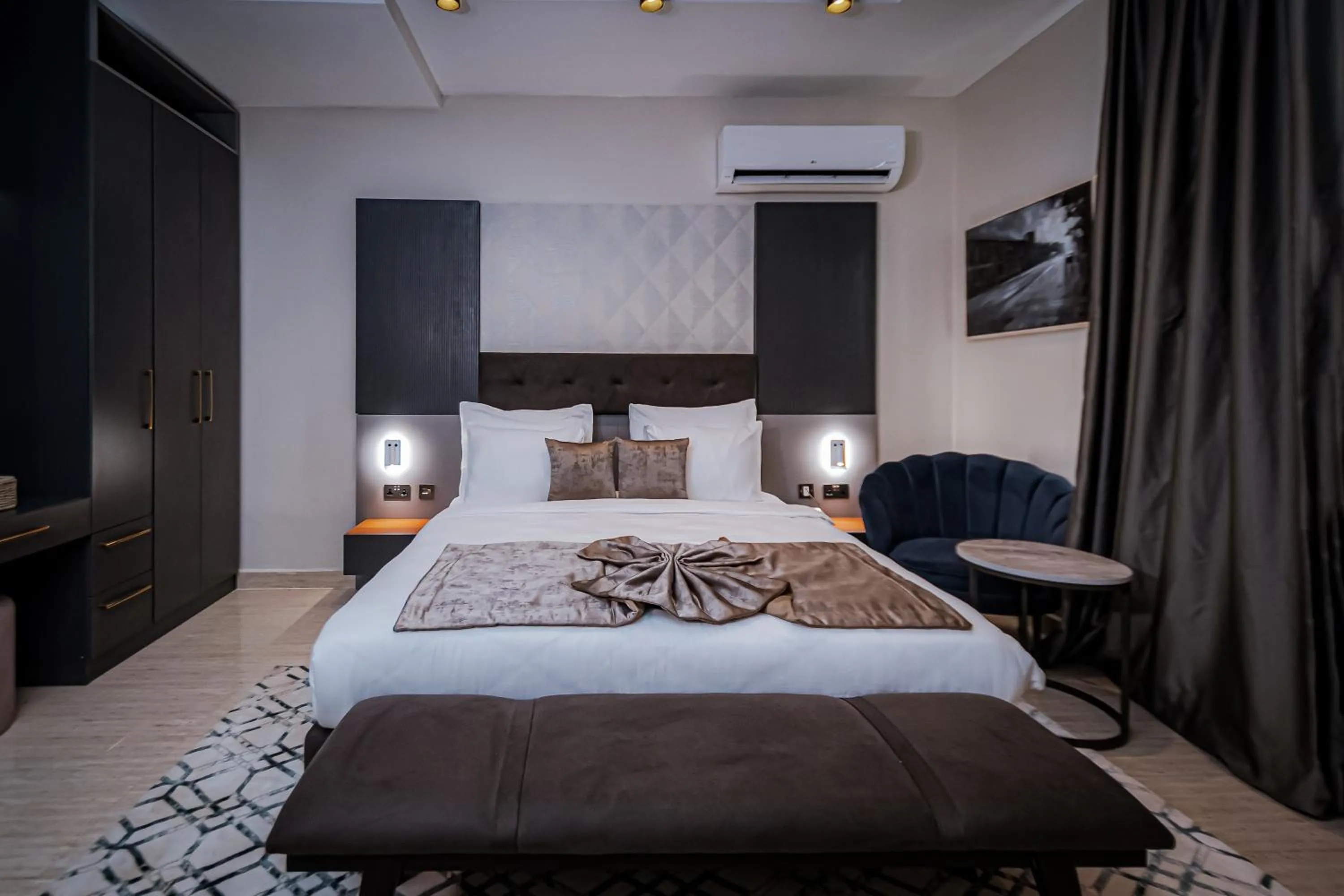 Bed in Wali's Suites