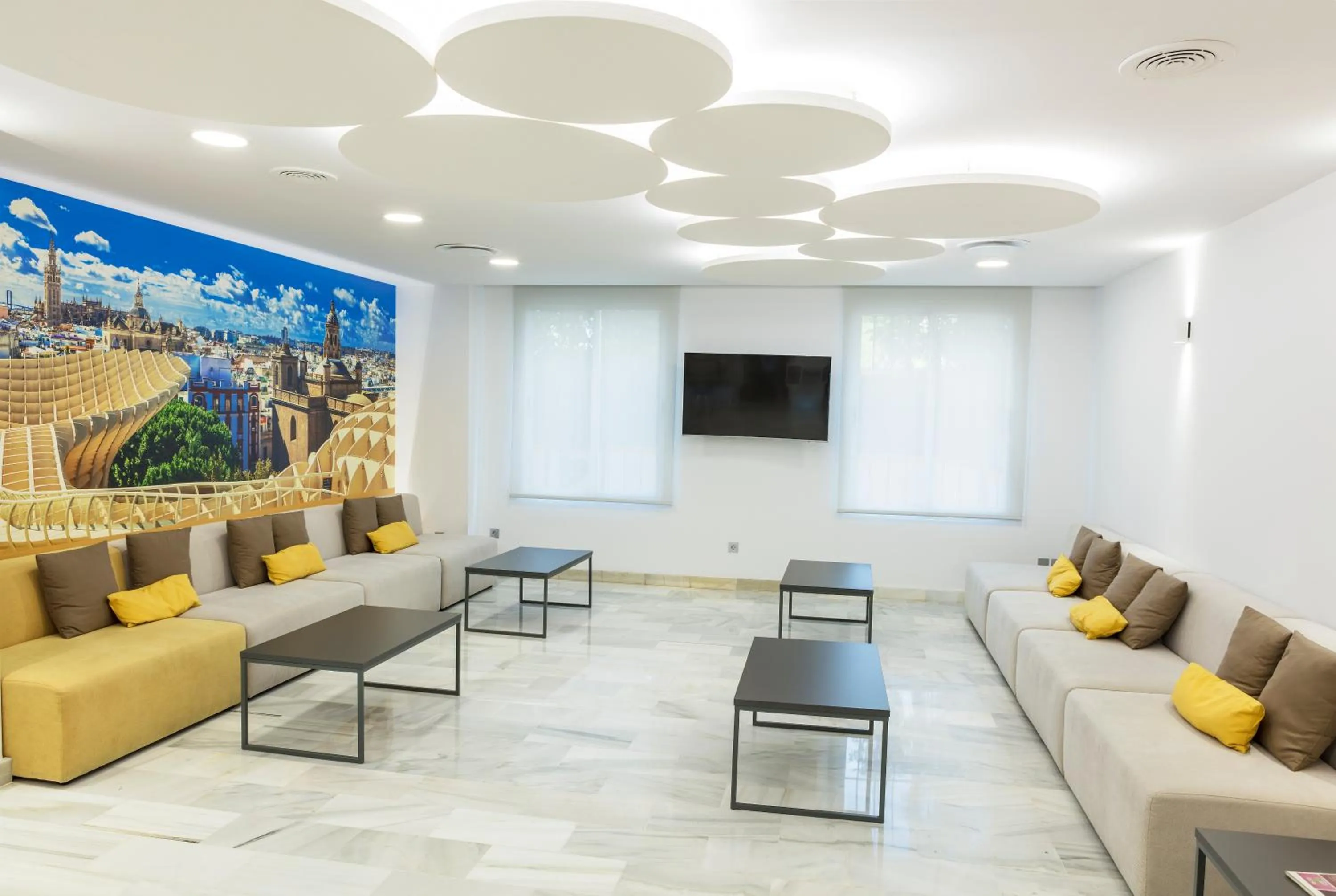 Communal lounge/ TV room in Bellavista Sevilla