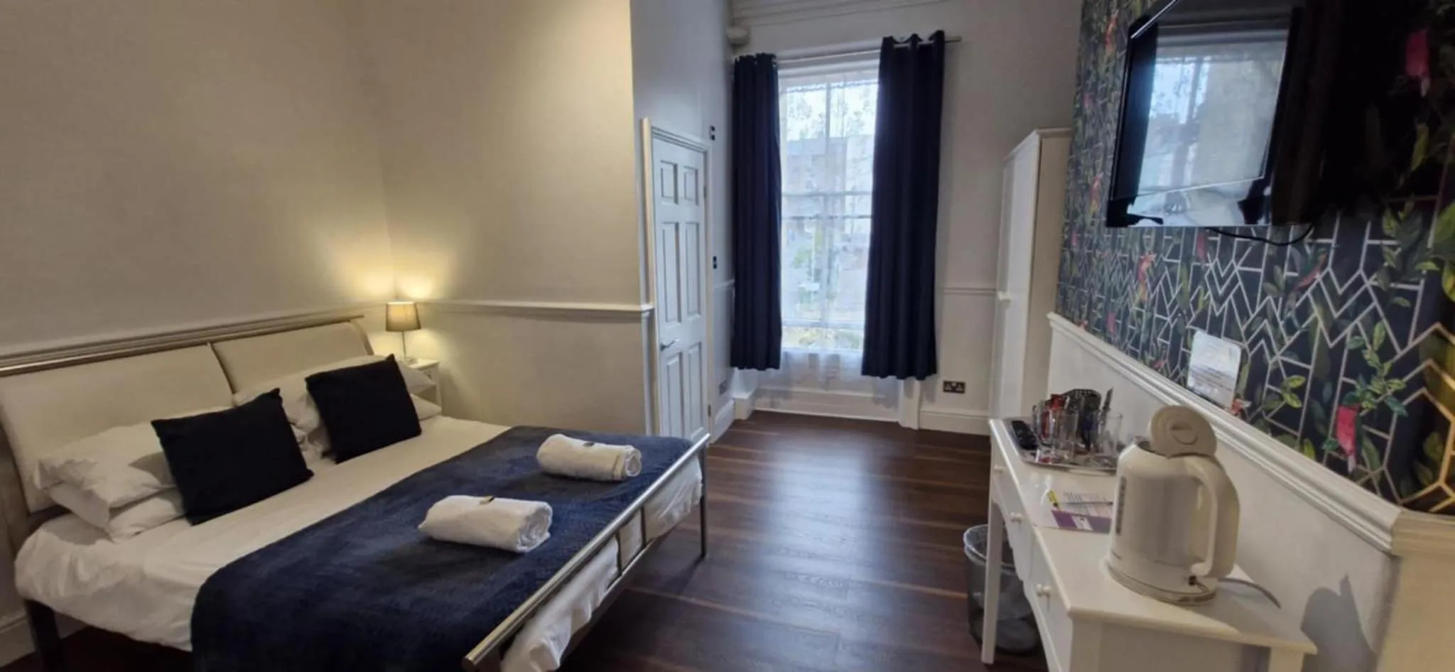 Photo of the whole room, Bed in LilyRose Hotel