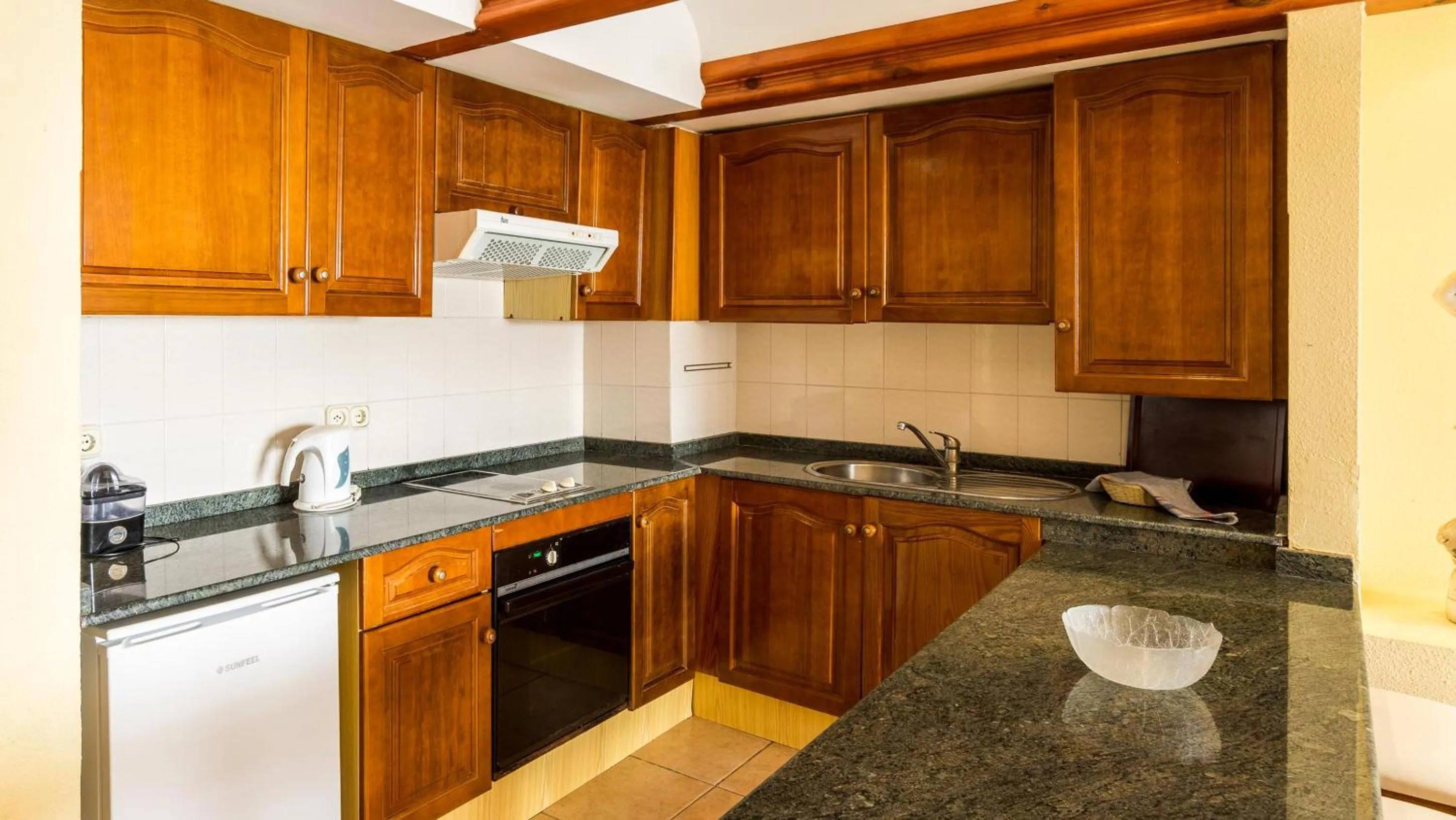 Kitchen or kitchenette in BLUESEA Apartamentos Callao Garden