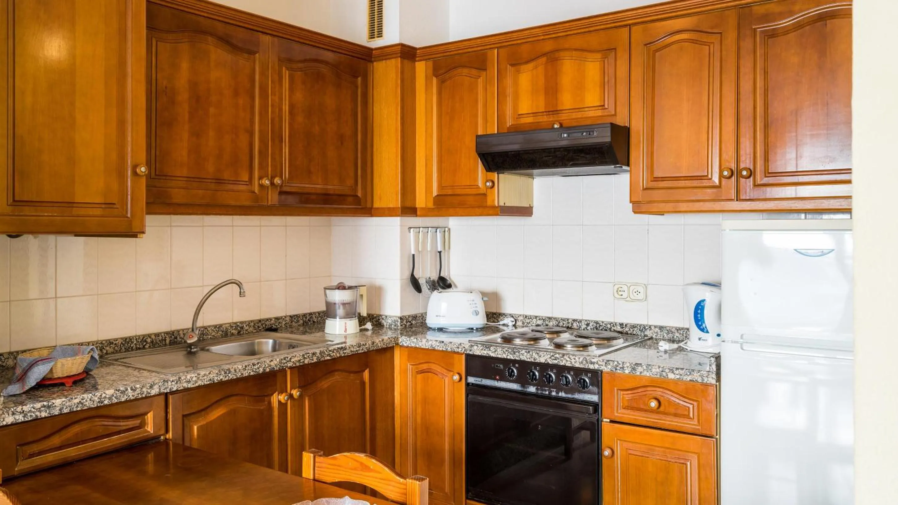 Kitchen or kitchenette in BLUESEA Apartamentos Callao Garden