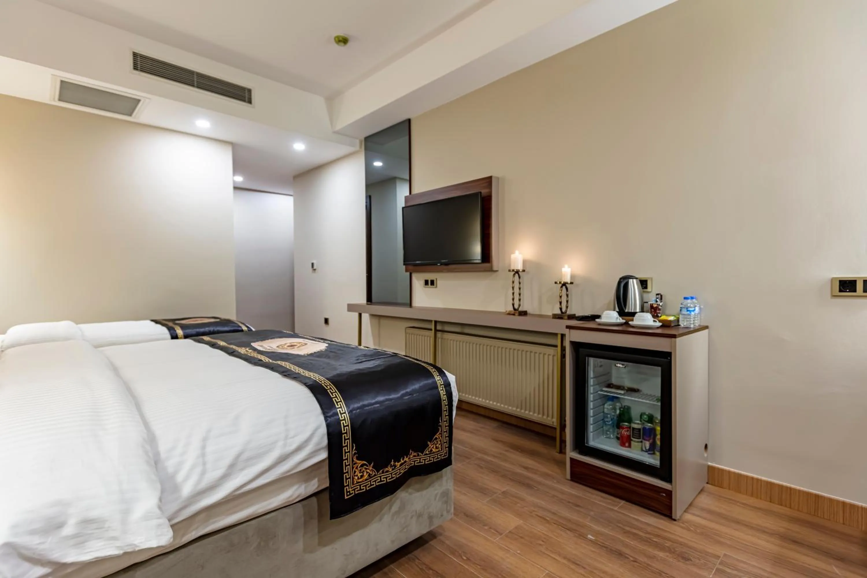 Bed in GRAND HAMİT By Karadayı Airport Hotel