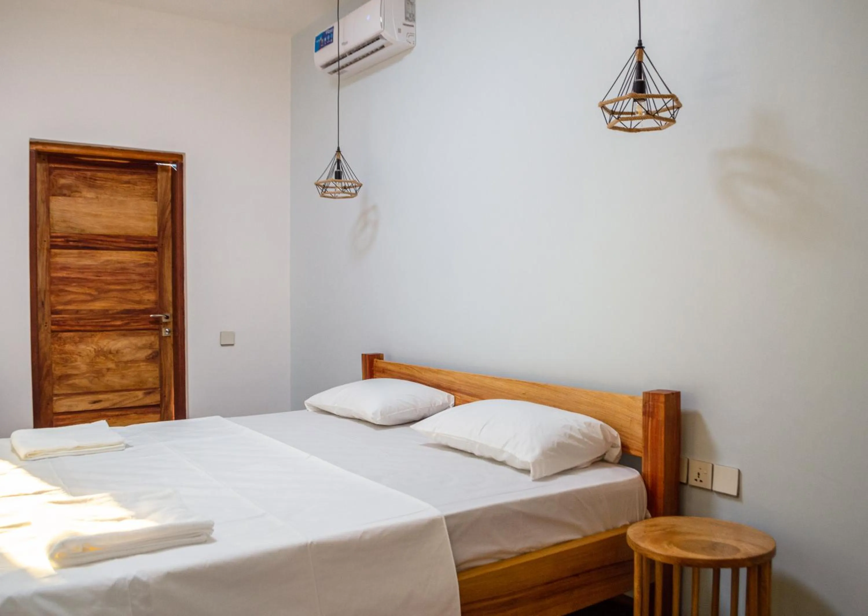 Bed in Nebo Apartments Paje