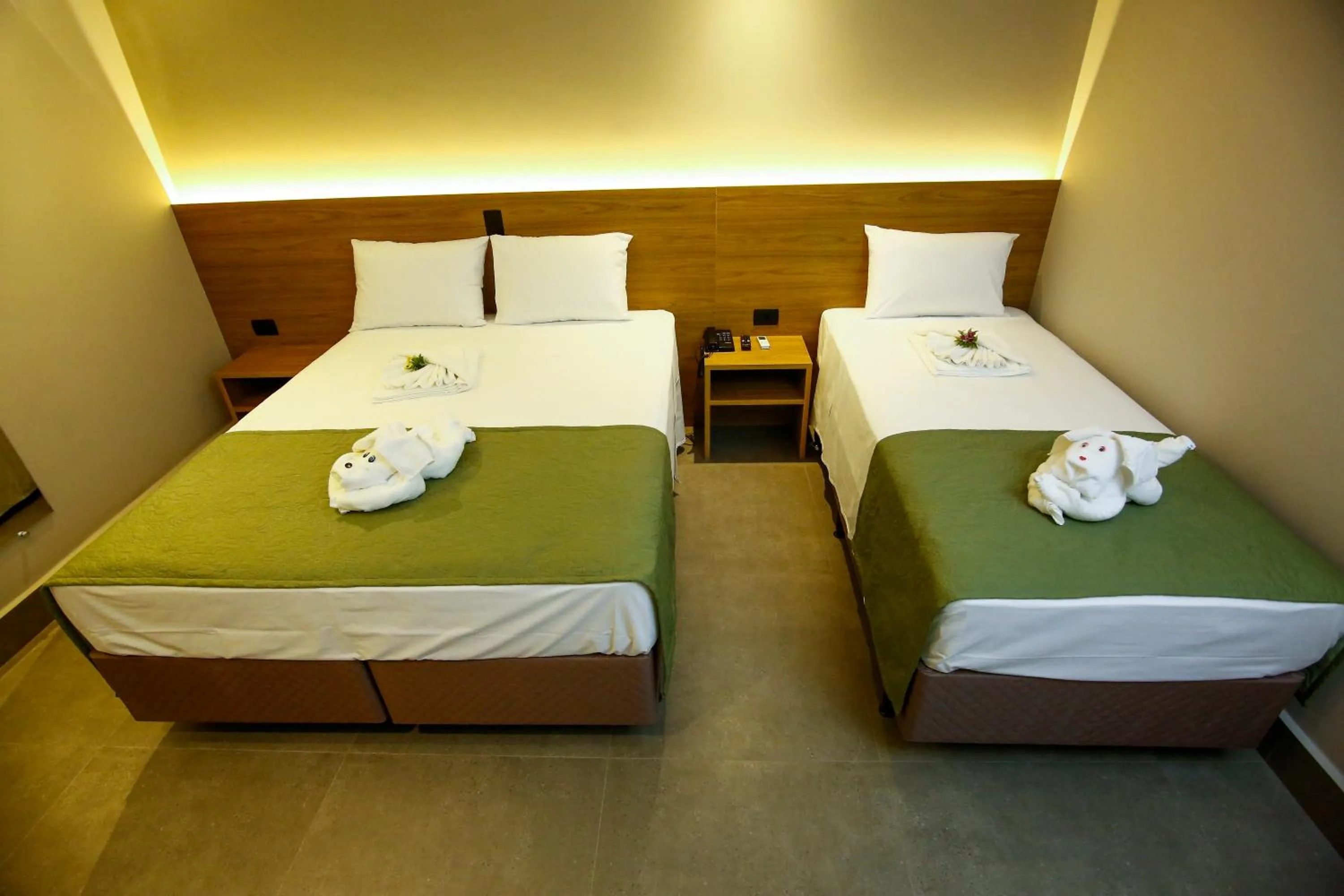 Bed in NEO PARK HOTEL