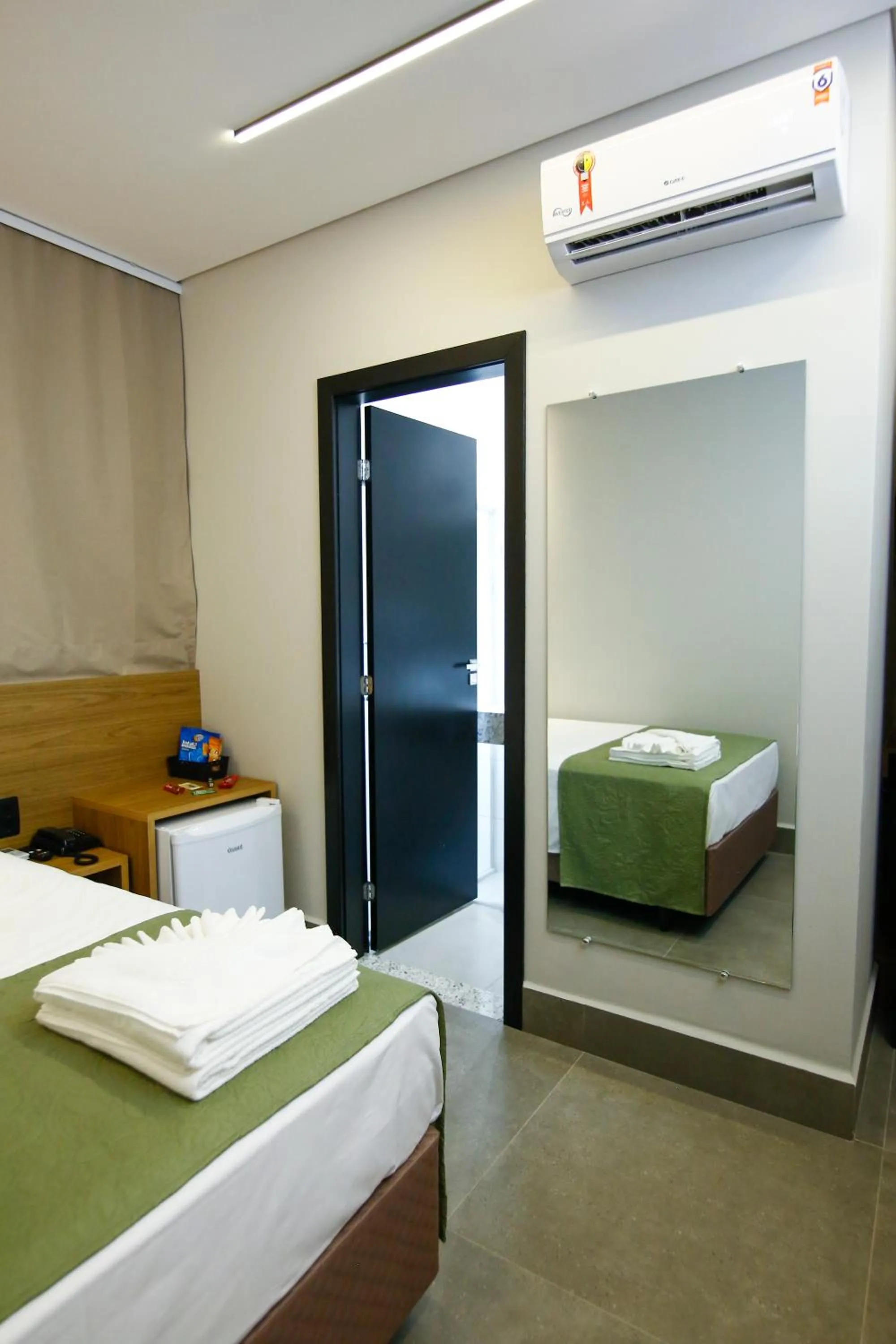 Bed in NEO PARK HOTEL