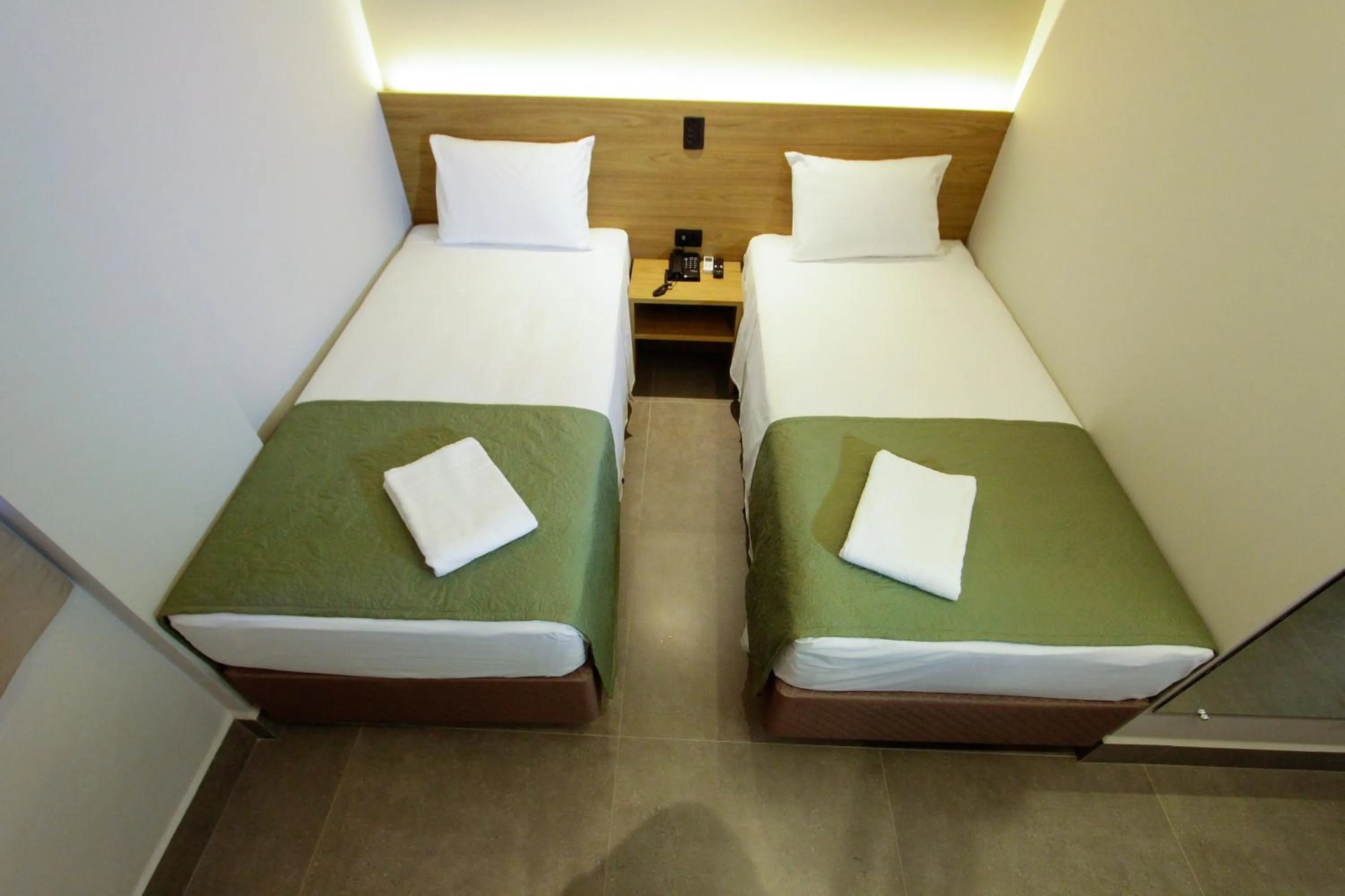 Bed in NEO PARK HOTEL