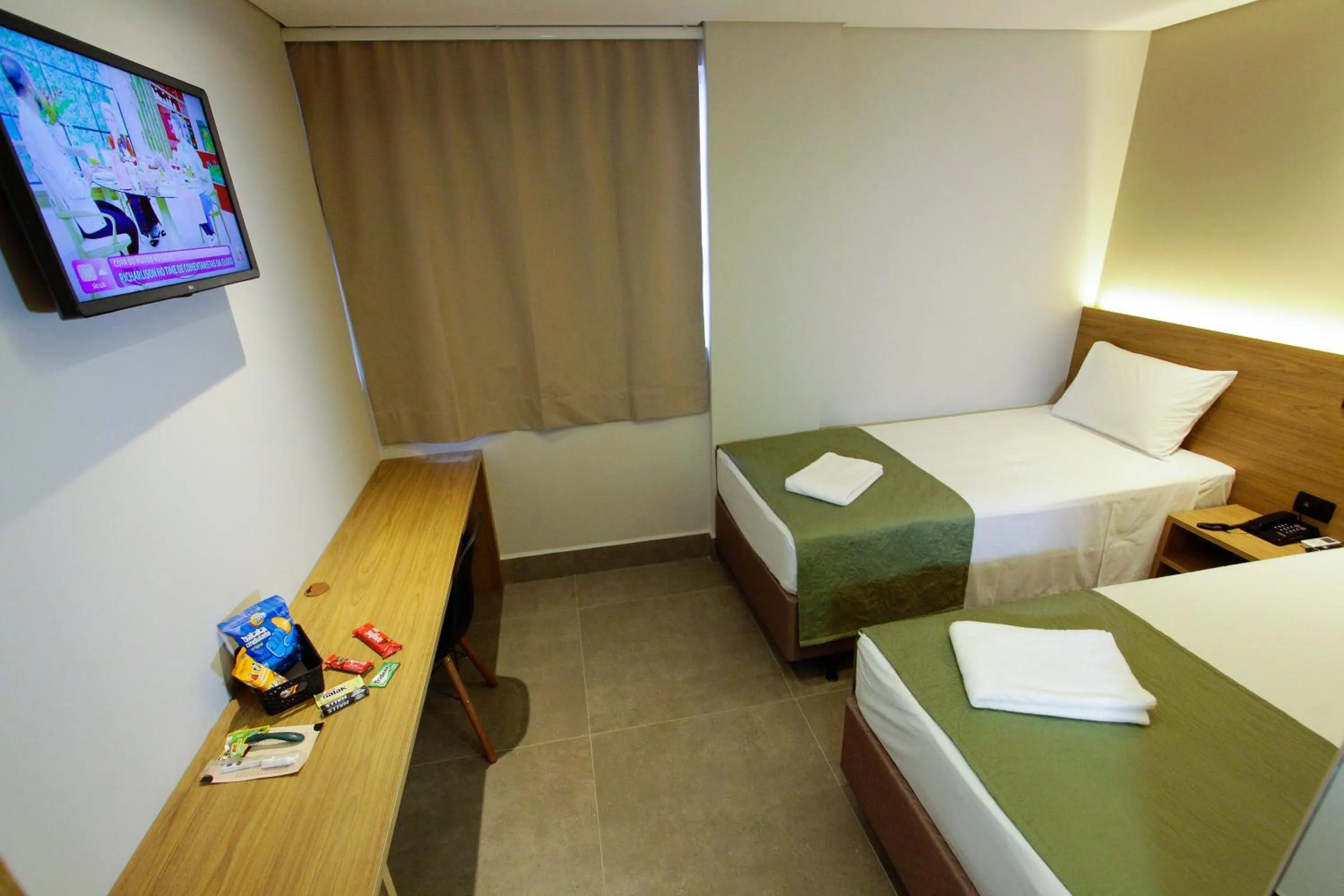 Bed in NEO PARK HOTEL