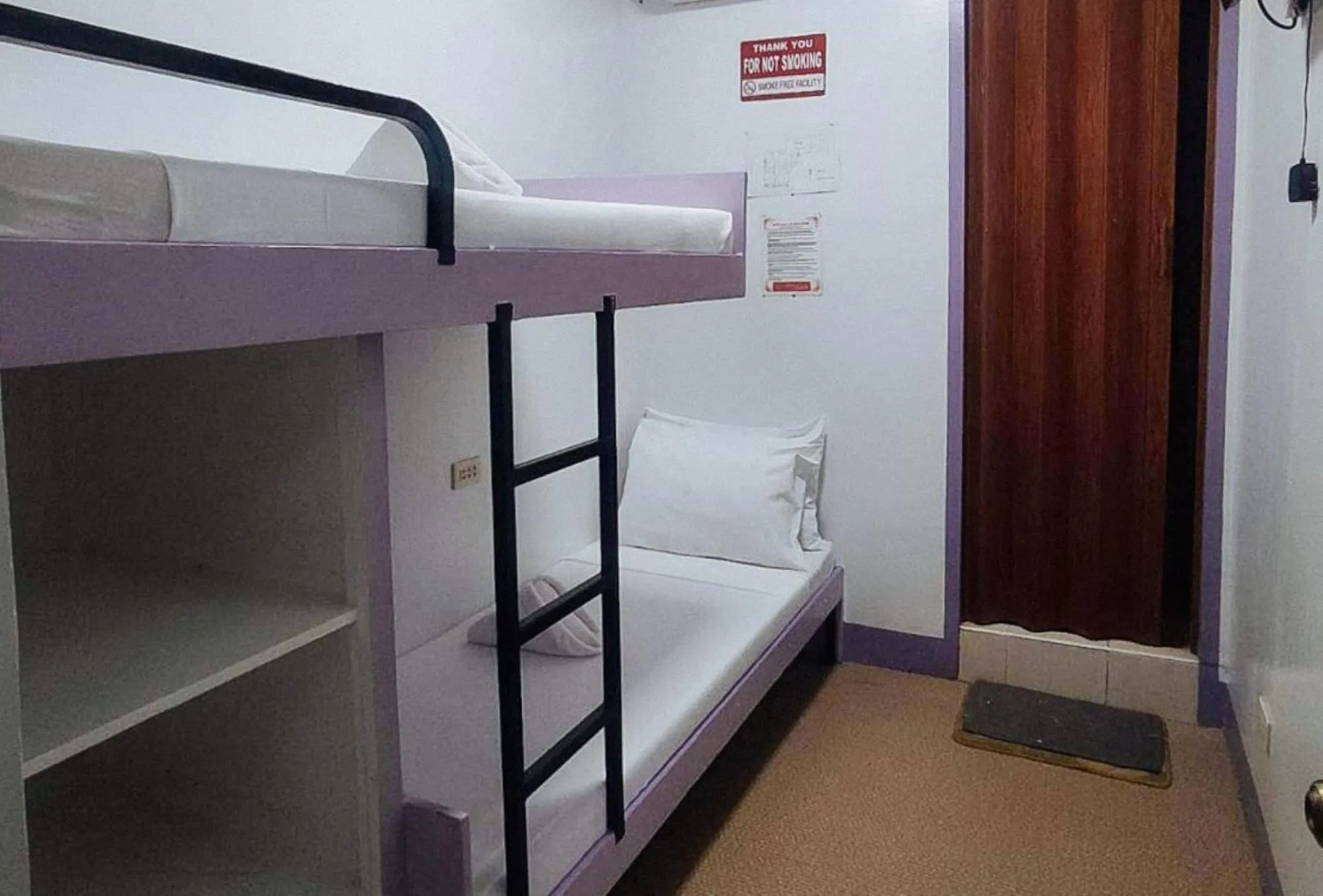 Photo of the whole room, Bed in RedDoorz @ Isabelle Tourist Hotel Hinatuan