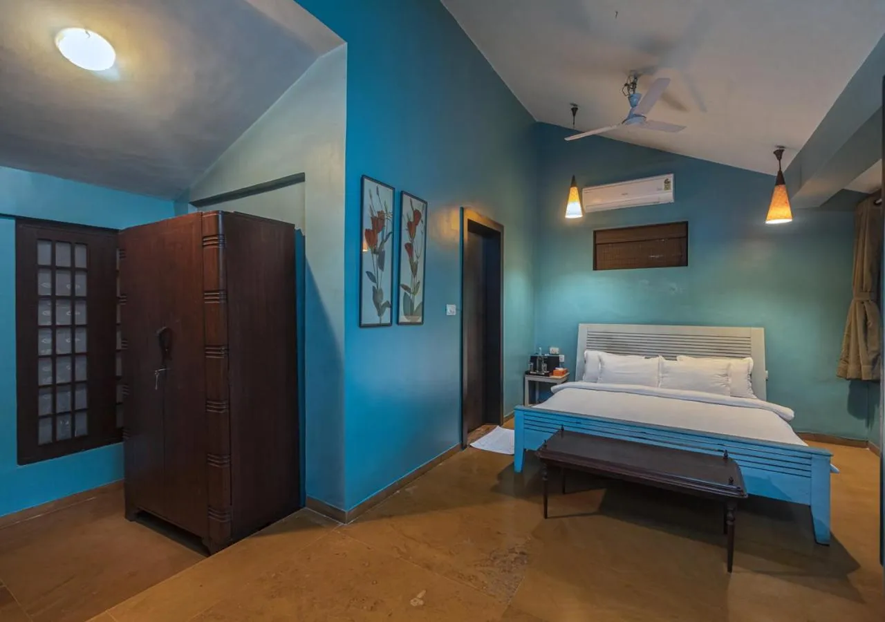 Bed in SaffronStays Oriana, Alibaug