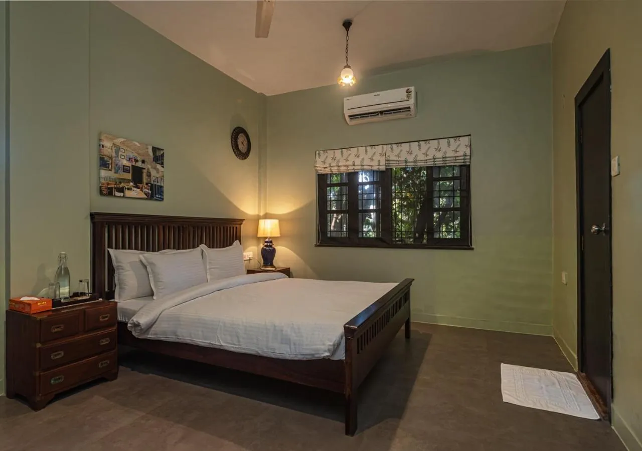 Bed in SaffronStays Oriana, Alibaug