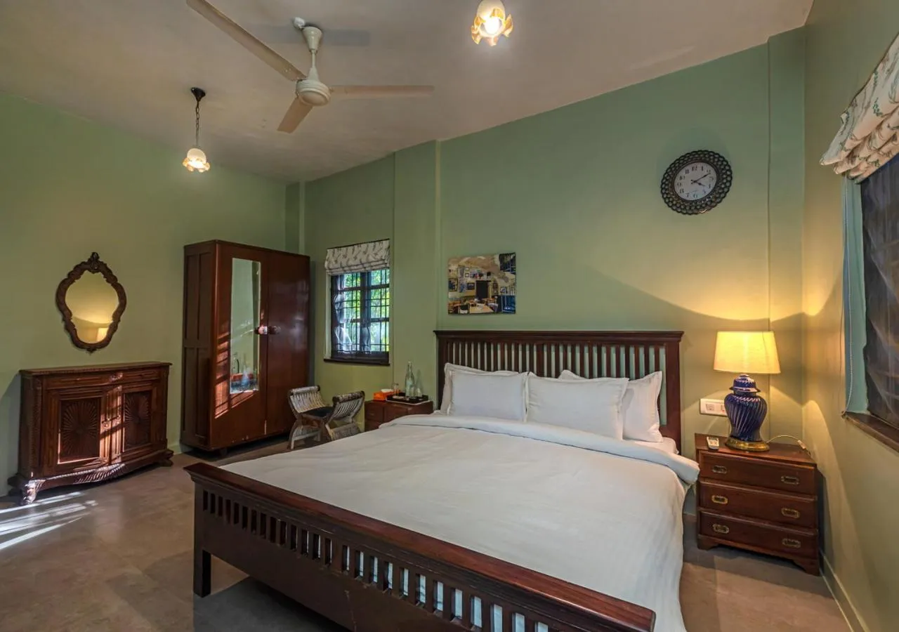 Bed in SaffronStays Oriana, Alibaug