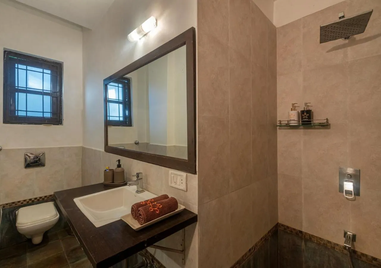 Toilet in SaffronStays Oriana, Alibaug