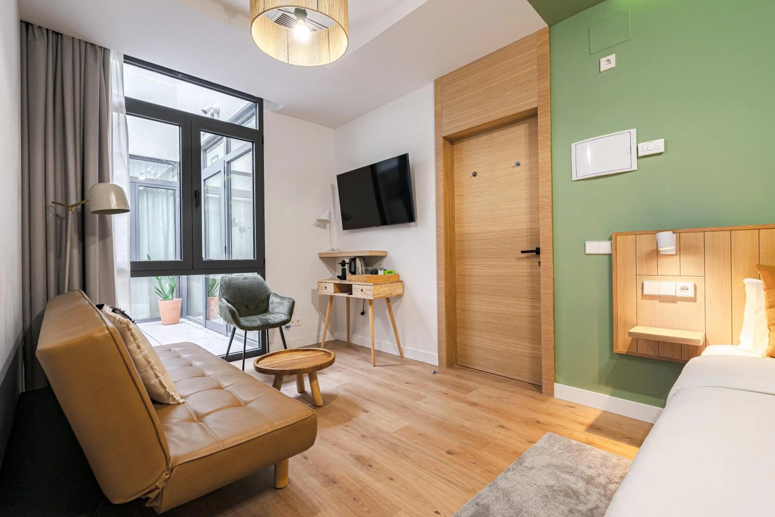 Photo of the whole room, Bed in Vallecas Suites by Olala Homes