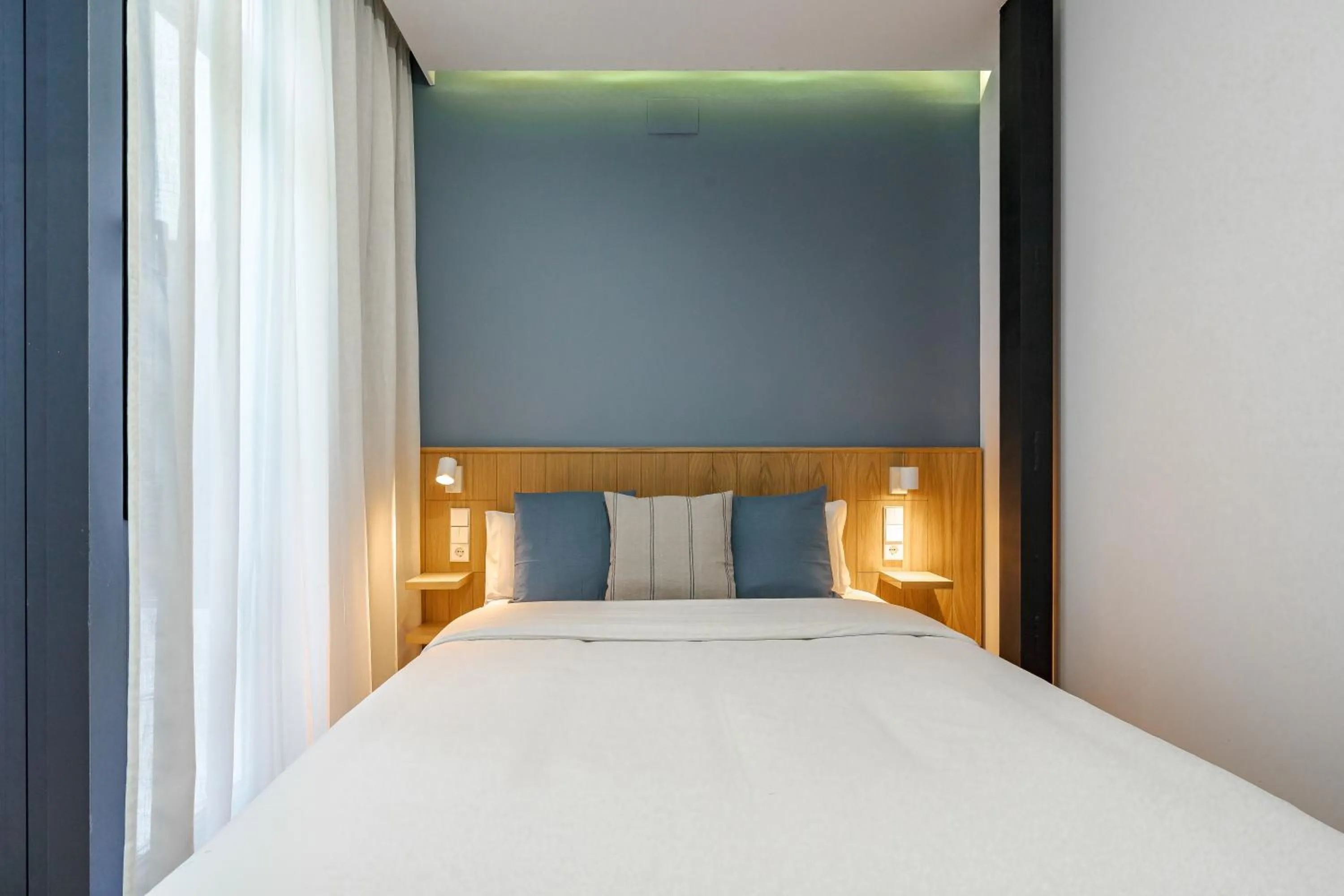Photo of the whole room, Bed in Vallecas Suites by Olala Homes