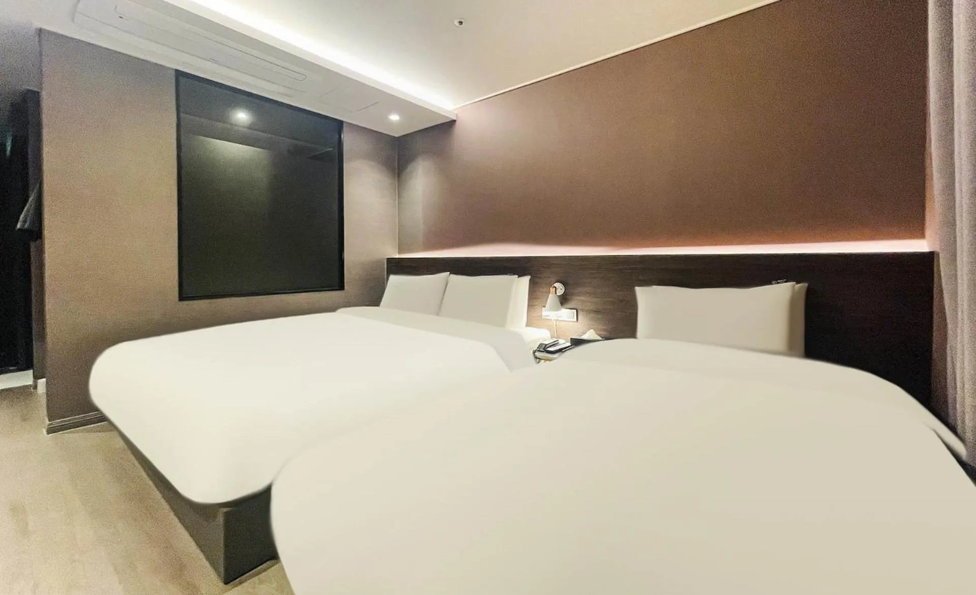 Bed in Brown Dot Hotel Yangsan Seochang