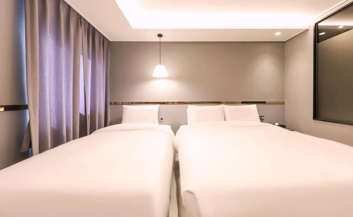 Bed in Brown Dot Hotel Yangsan Seochang