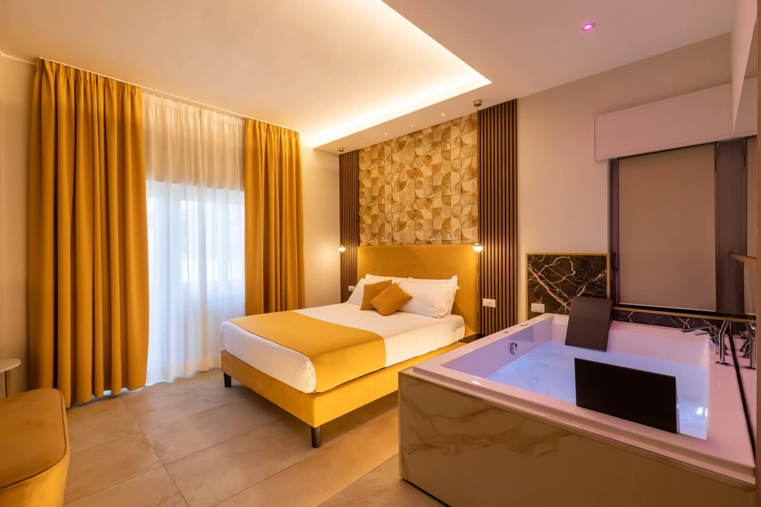 Photo of the whole room, Bed in AlbaDea Suites&Jacuzzi