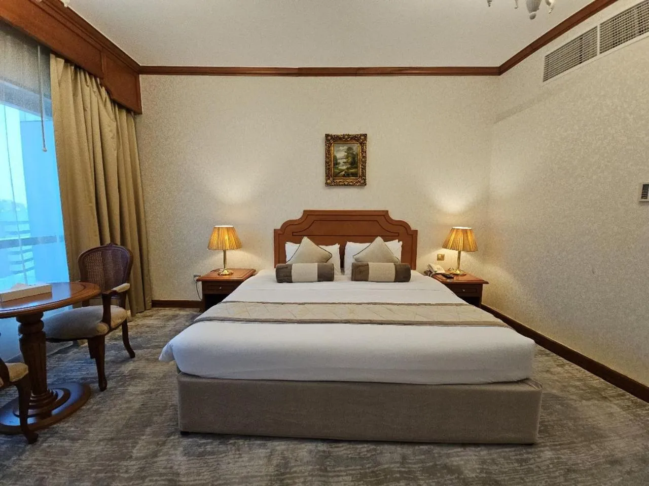 Bed in Royal Concorde Hotel & Suite