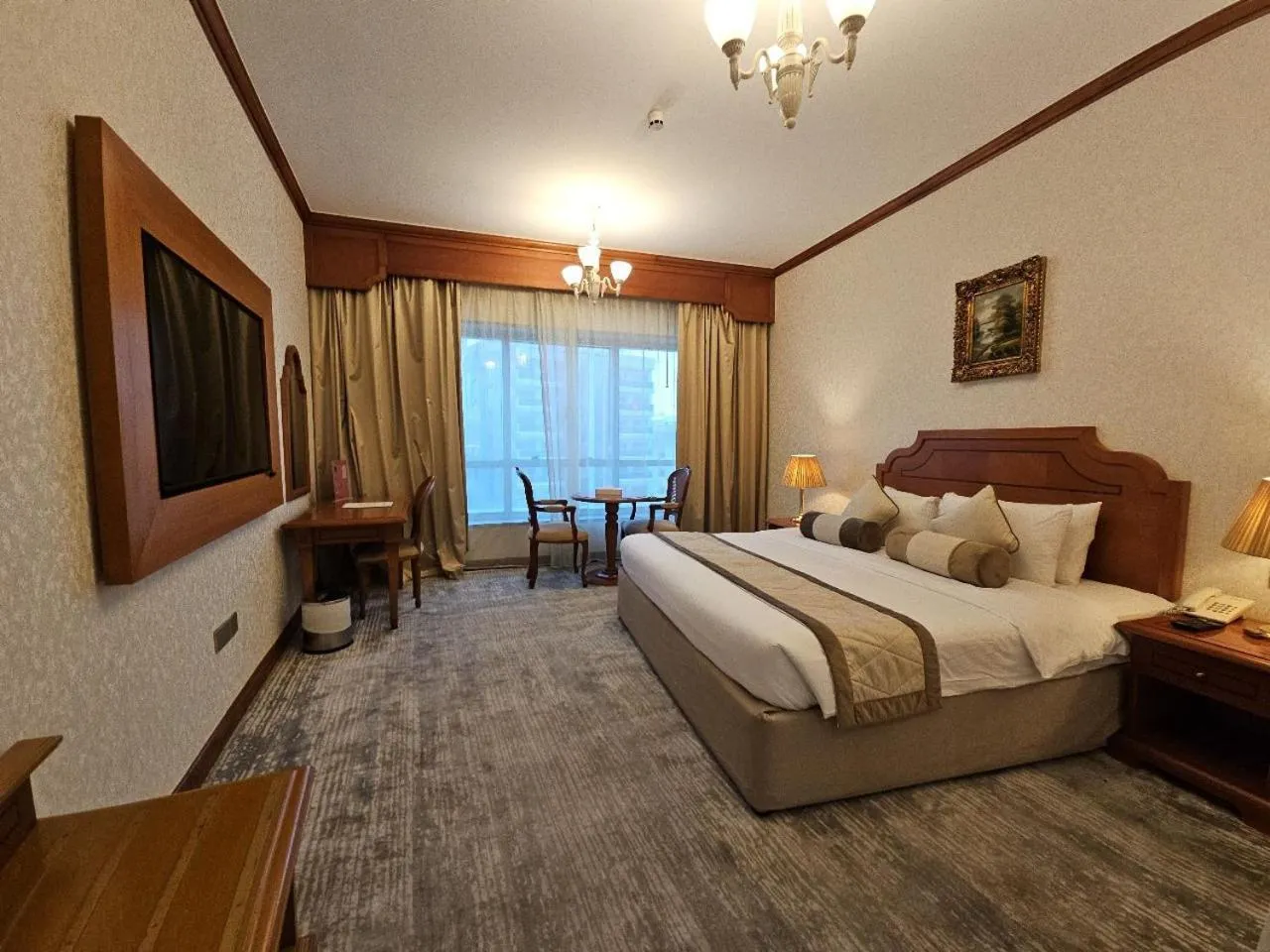 Bed in Royal Concorde Hotel & Suite