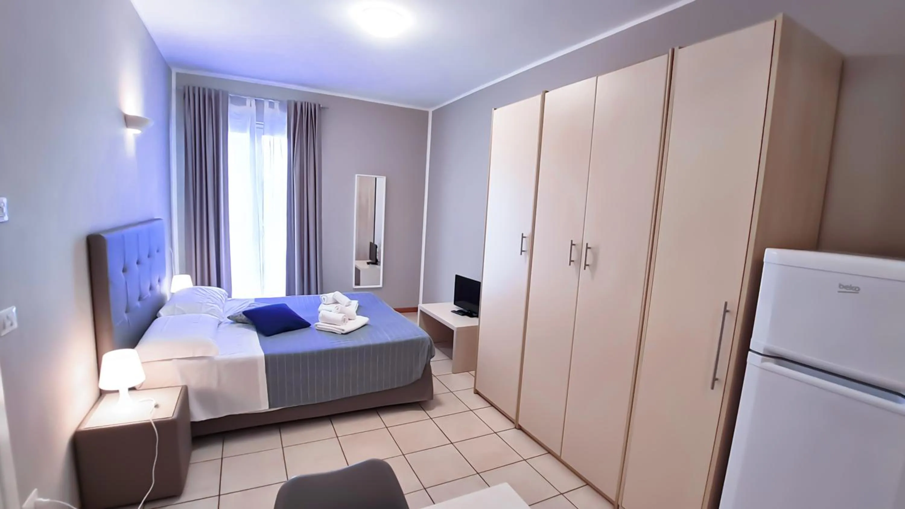Photo of the whole room, Bed in Residence Marittimo Riccione