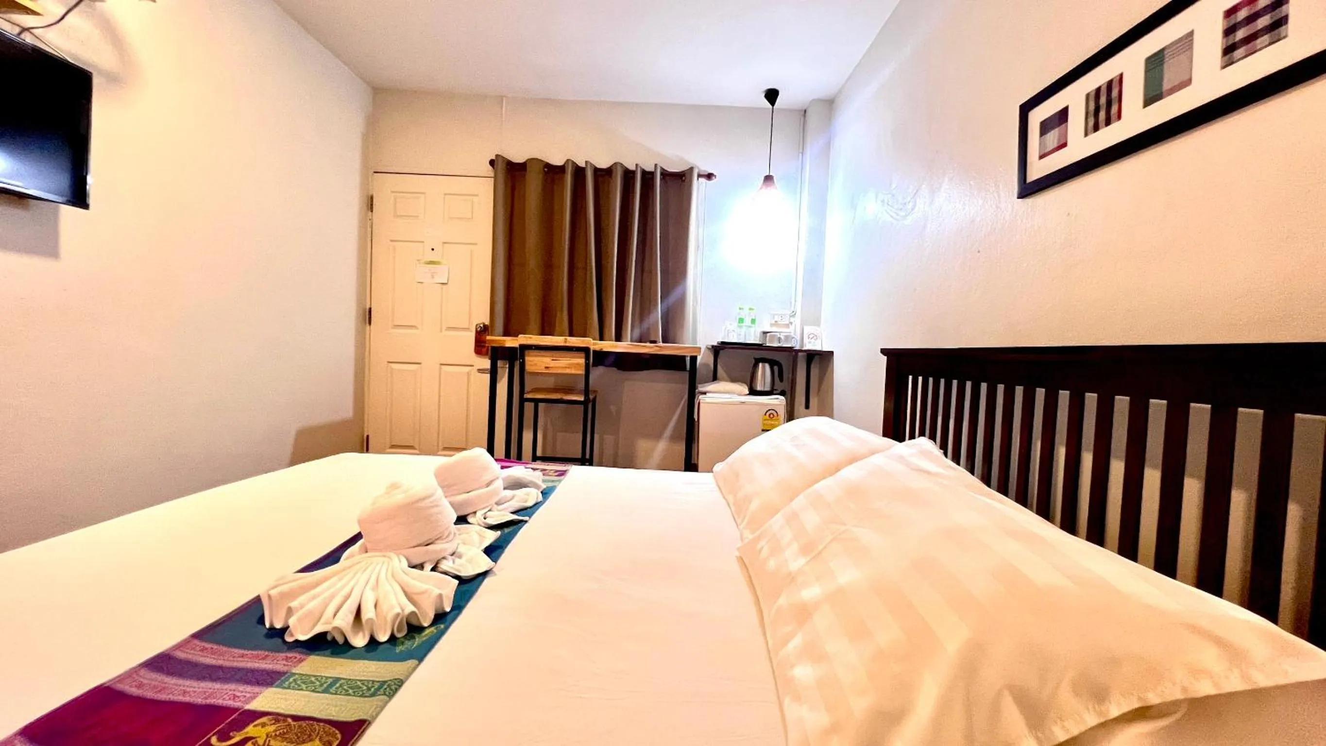 Bed in UDEE Cozy Hotel