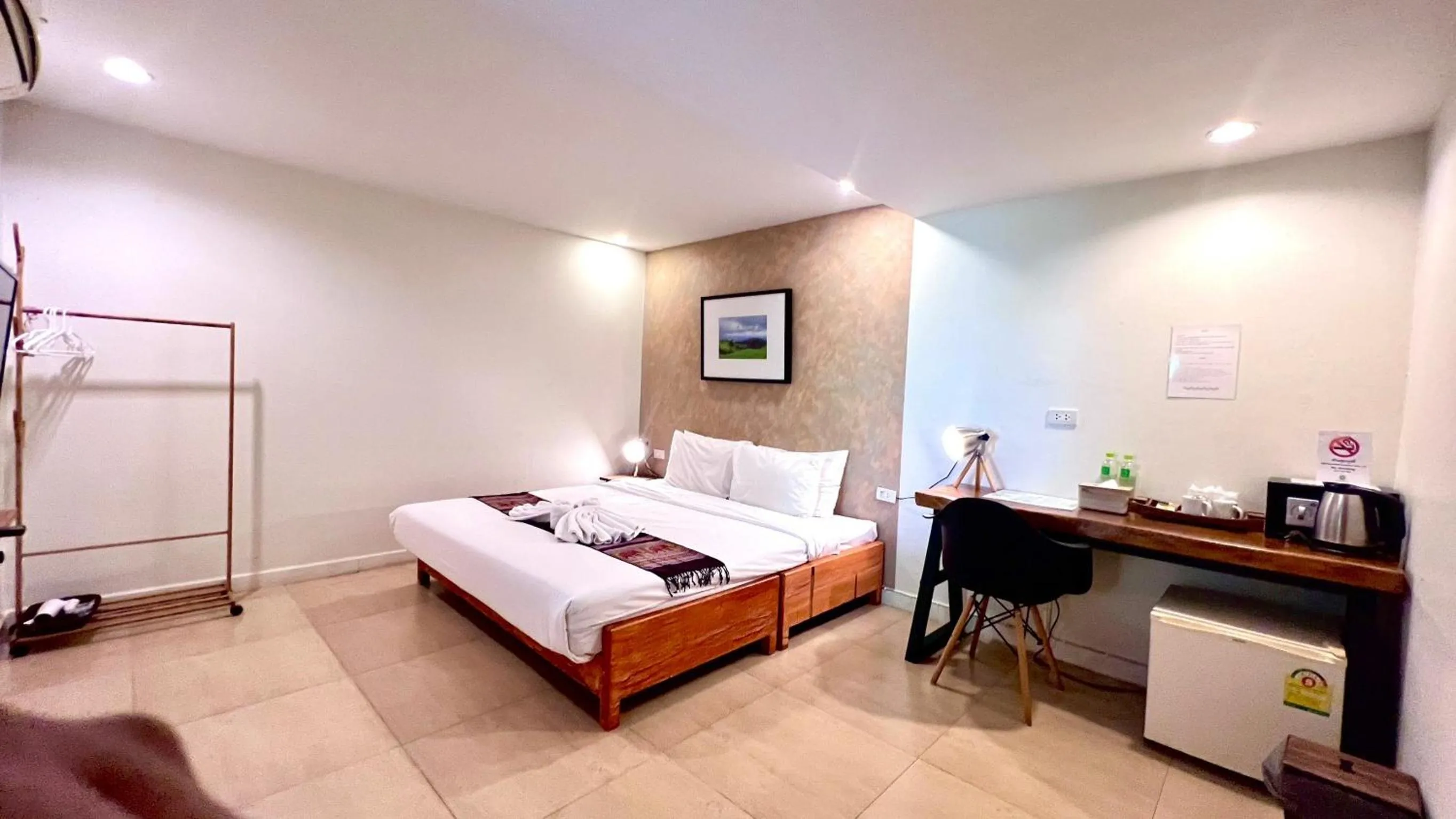 Bed in UDEE Cozy Hotel