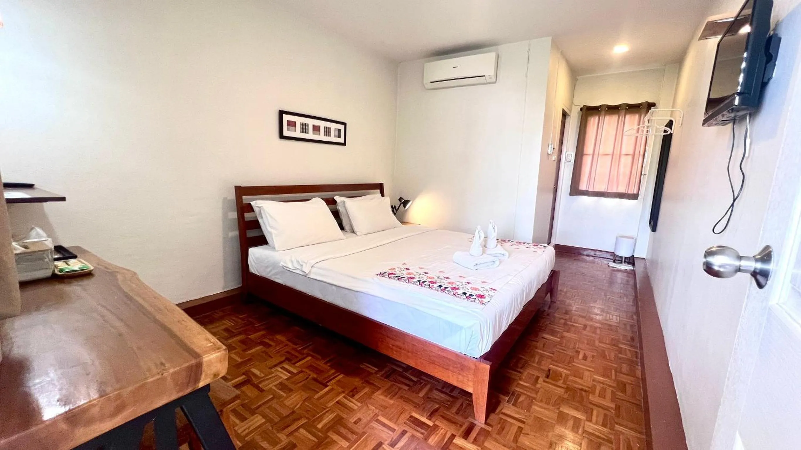 Bed in UDEE Cozy Hotel