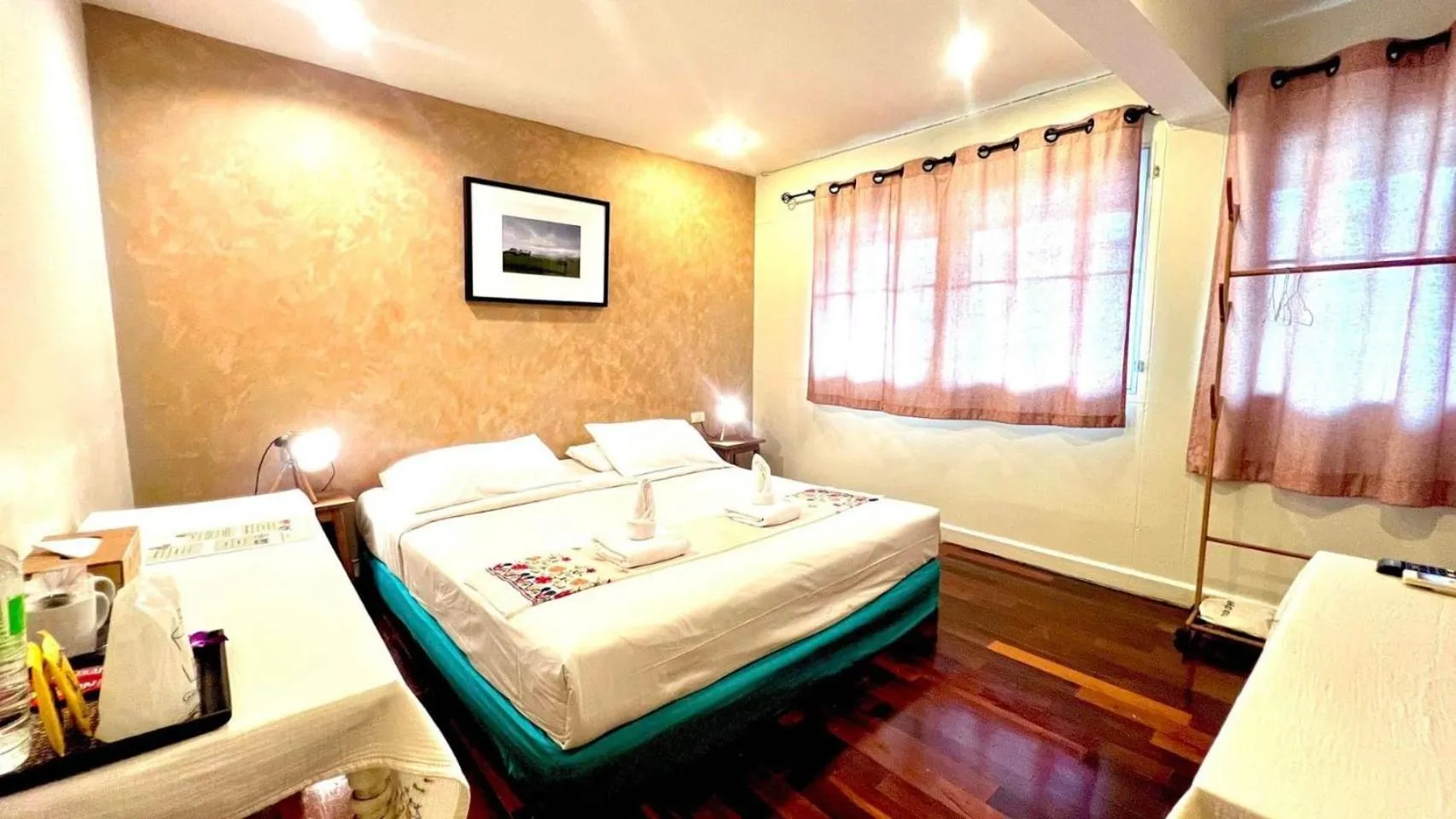 Bed in UDEE Cozy Hotel