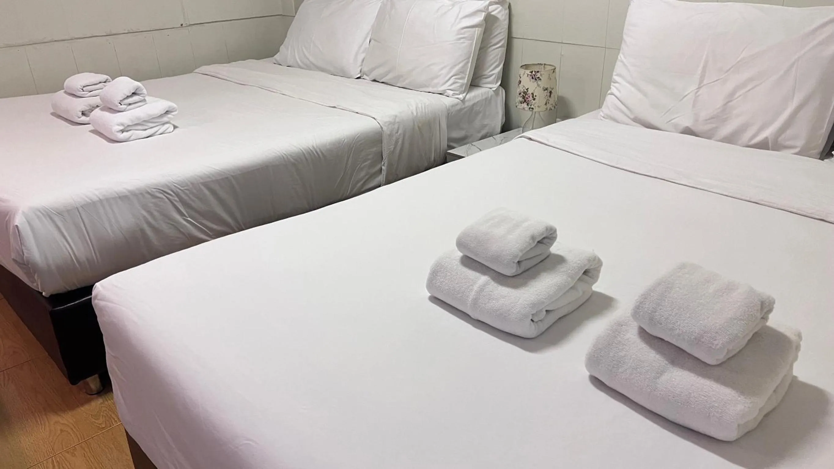 Bed in UDEE Cozy Hotel