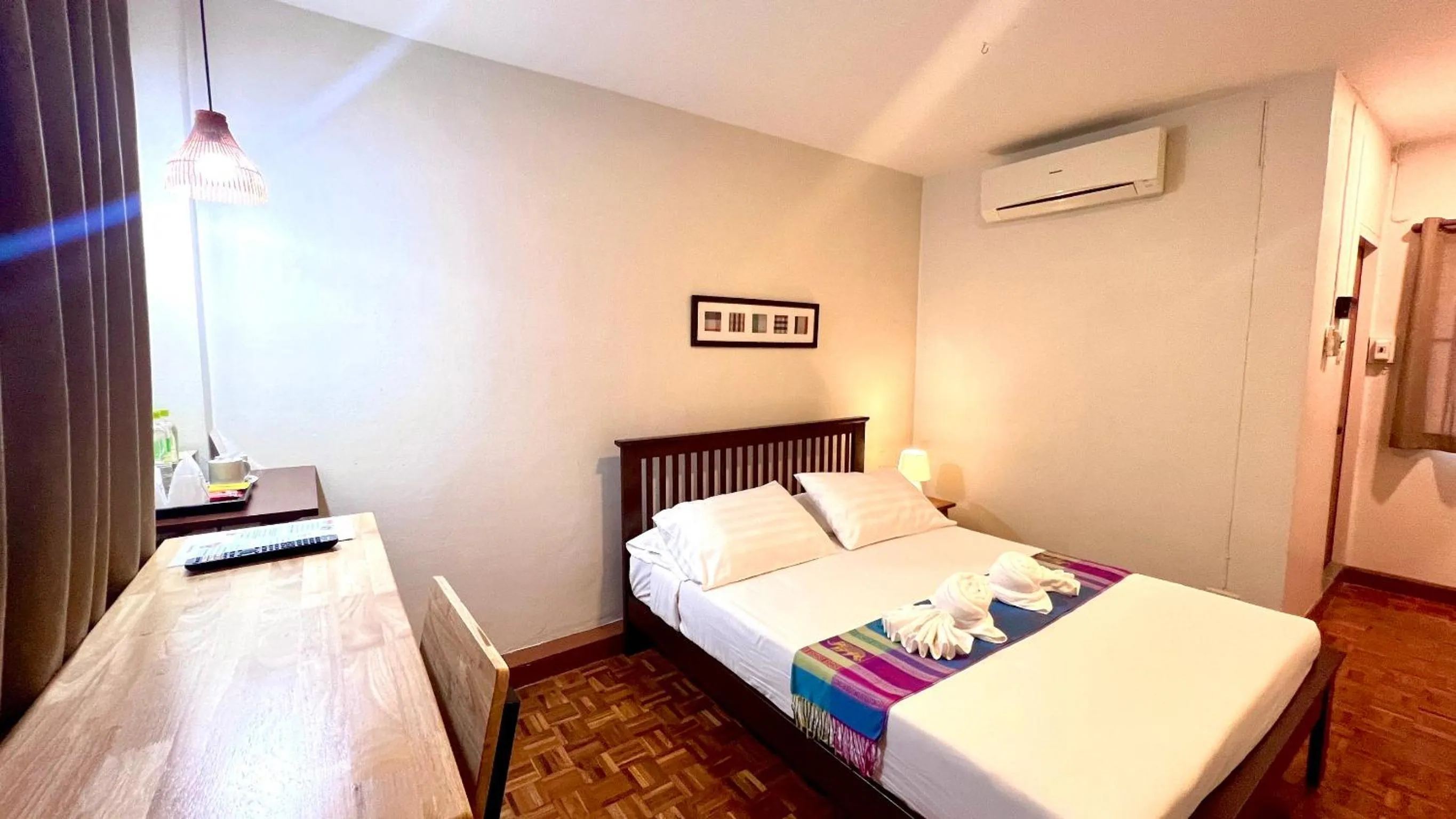 Bed in UDEE Cozy Hotel