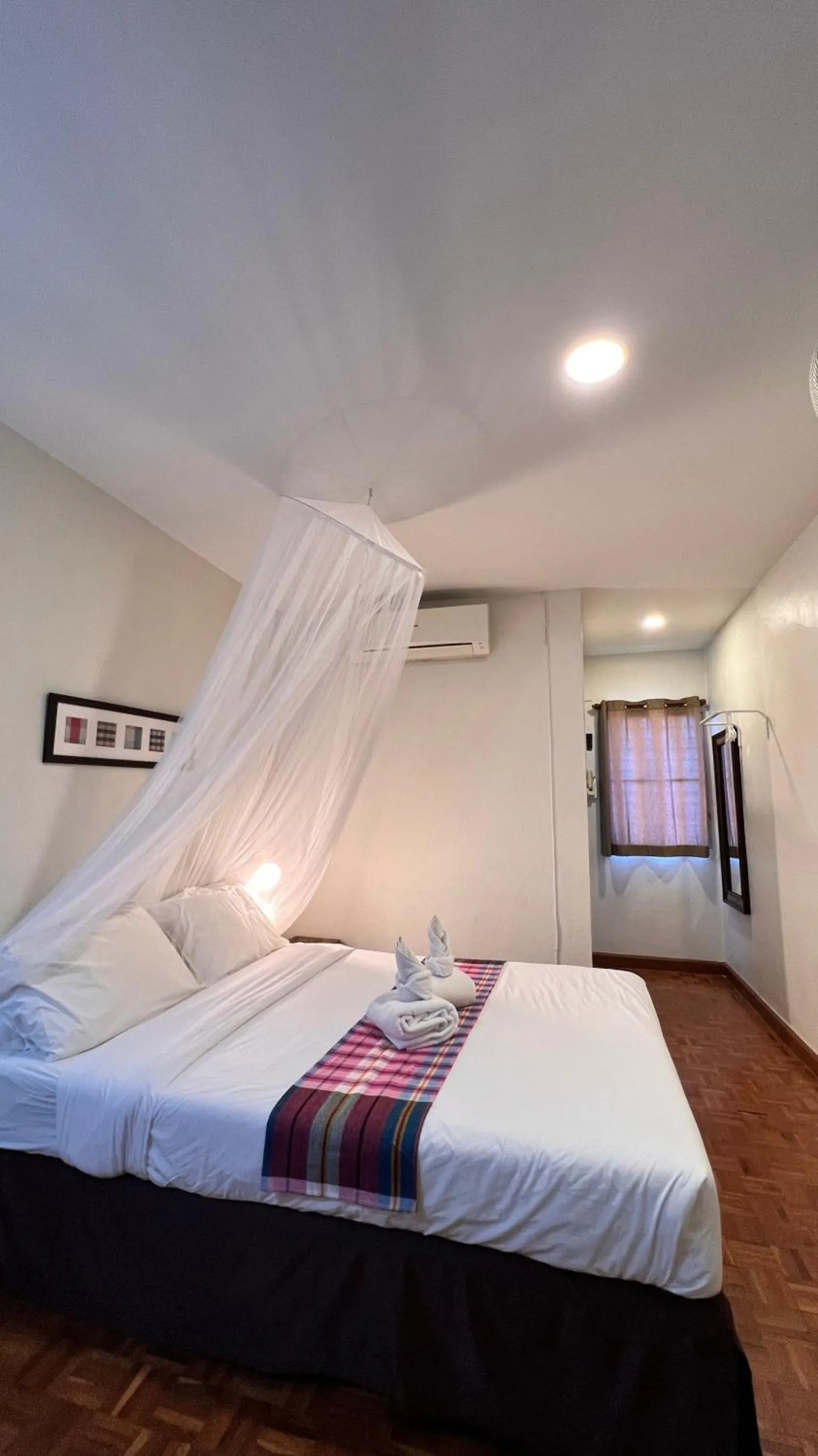 Bed in UDEE Cozy Hotel