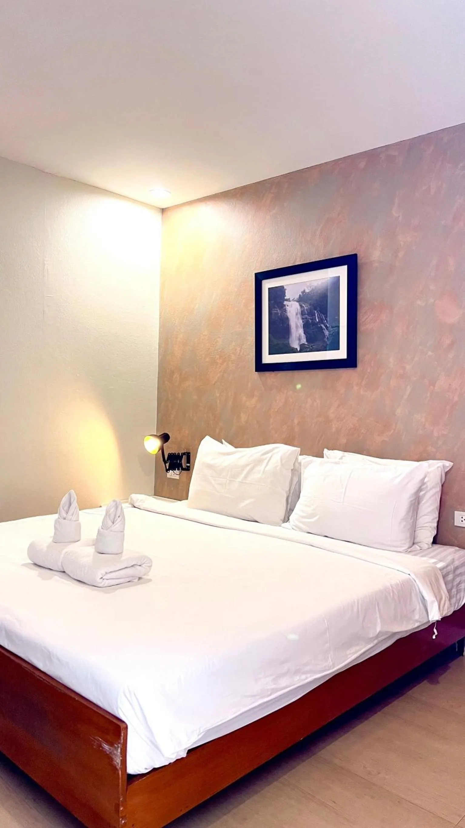 Bed in UDEE Cozy Hotel