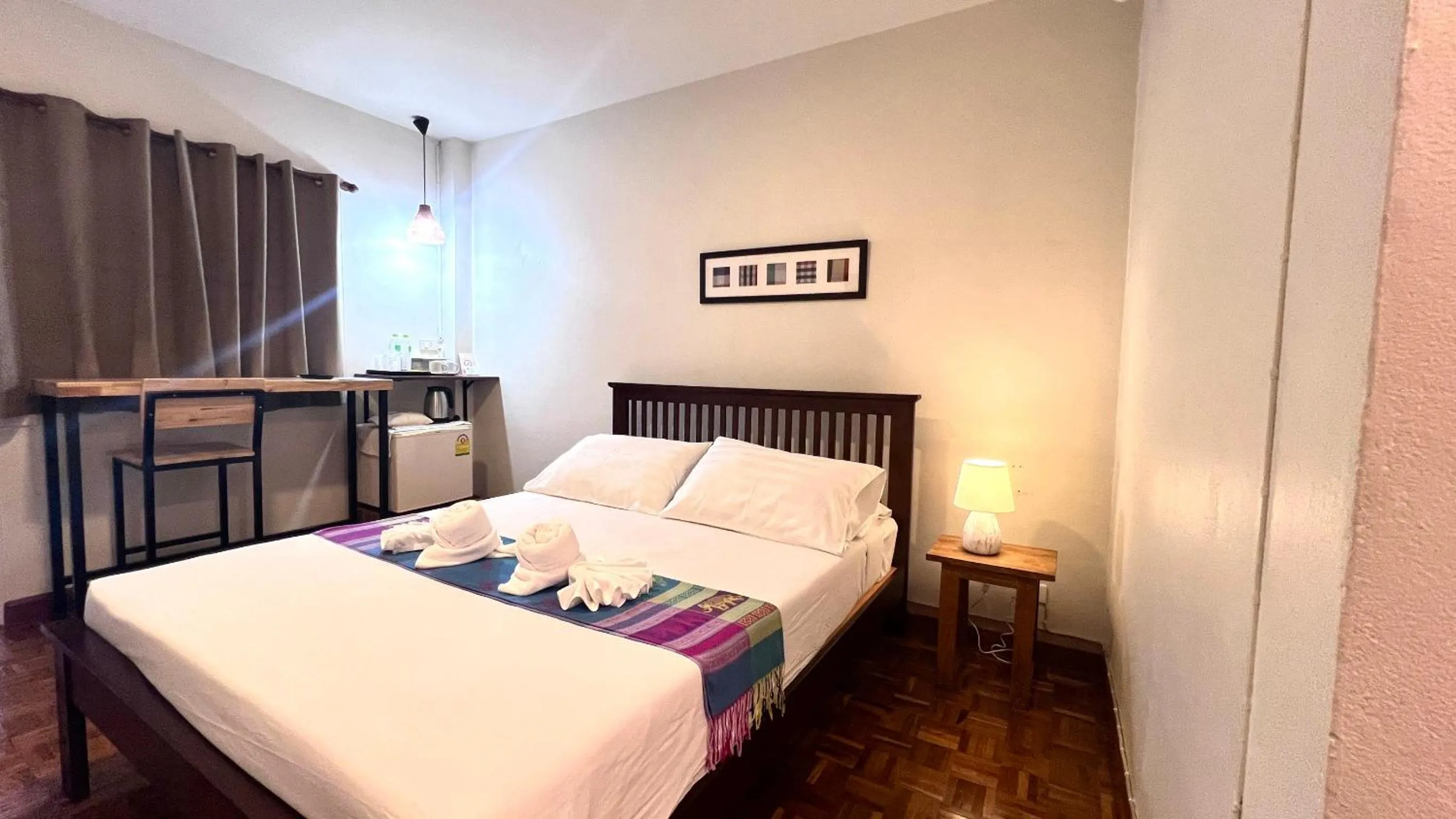 Bed in UDEE Cozy Hotel