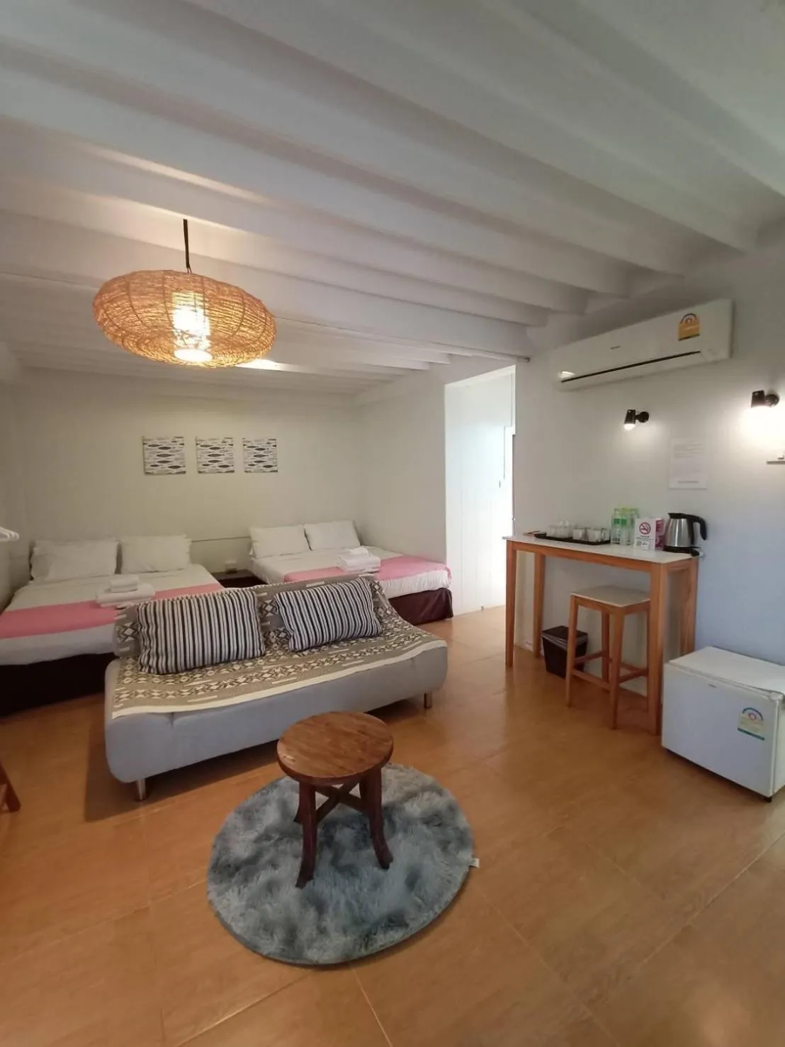 Bed in UDEE Cozy Hotel