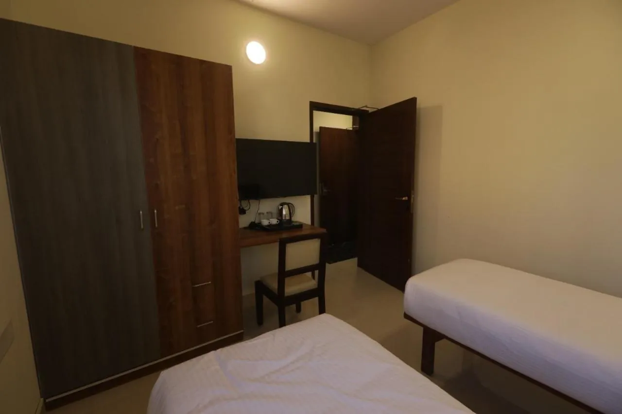 wardrobe in Elysian Grand Hotel