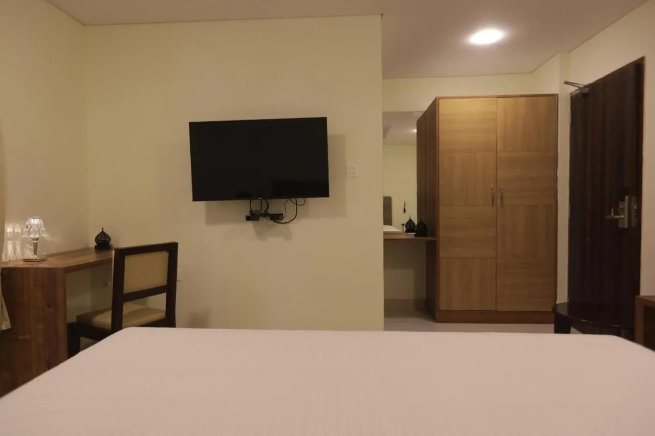 wardrobe in Elysian Grand Hotel