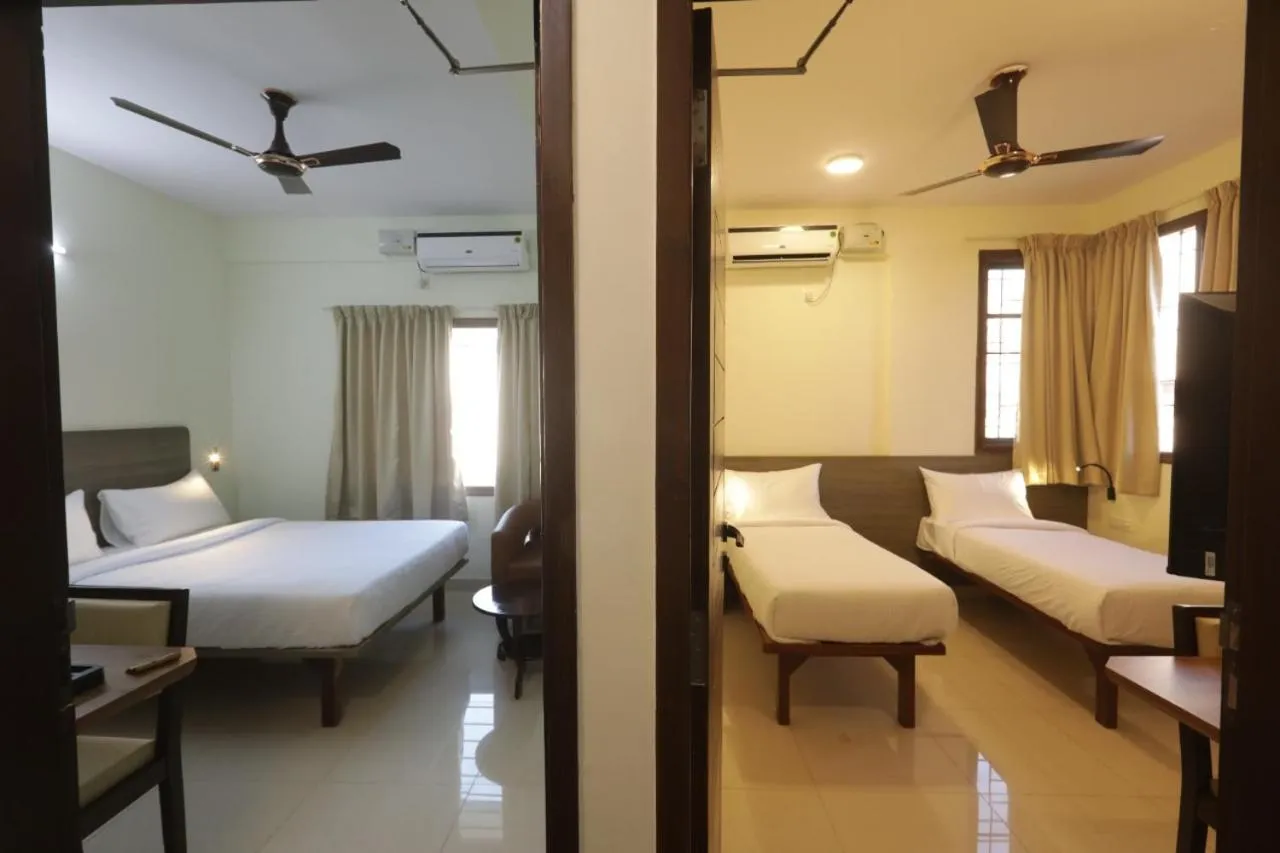 Bed in Elysian Grand Hotel