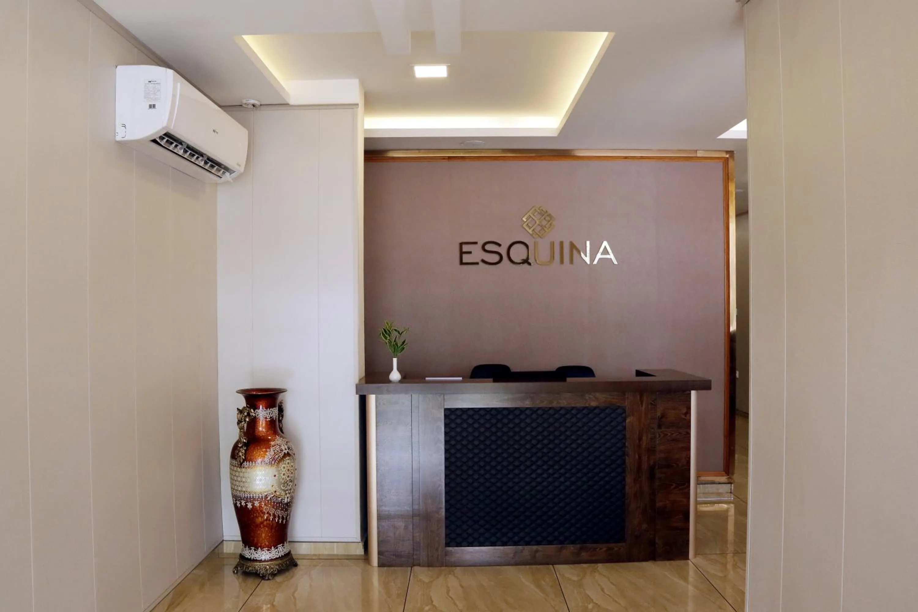 Property logo or sign in ESQUINA RESIDENCY