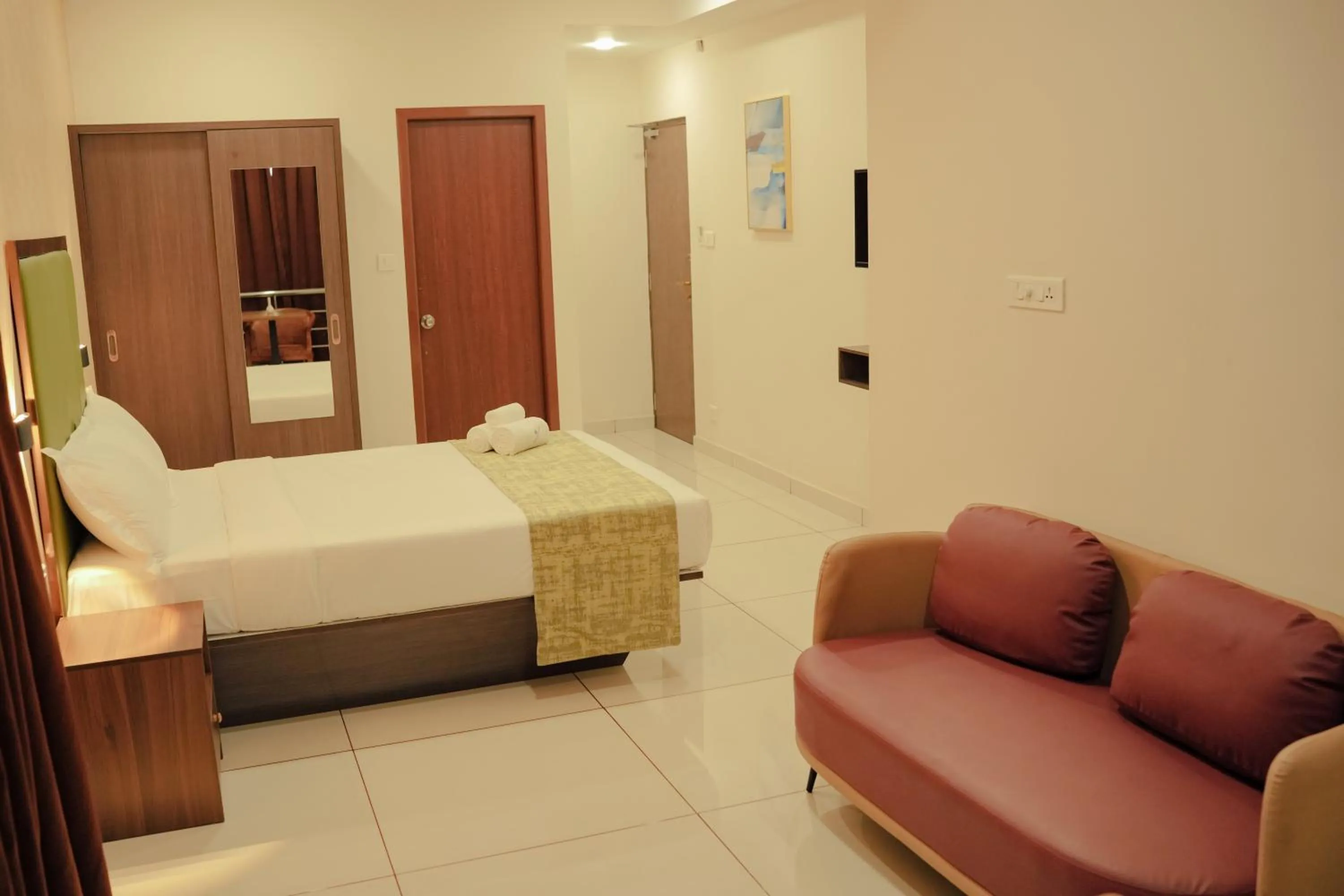 Bed in ESQUINA RESIDENCY